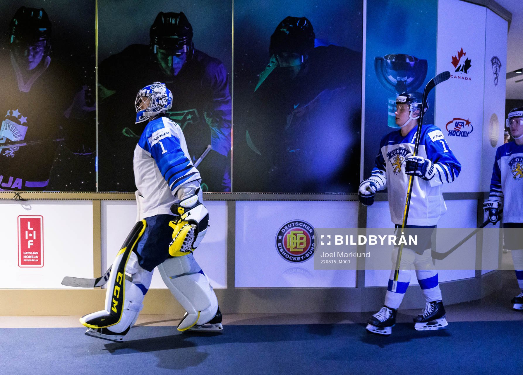Goaltender Leevi Meriläinen and Kasper Puutio of Finland