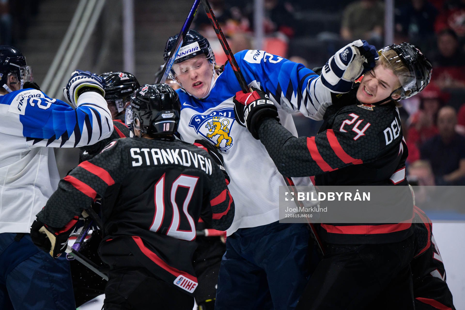 Samuel Helenius of Finland fights with Ethan del Mastro of