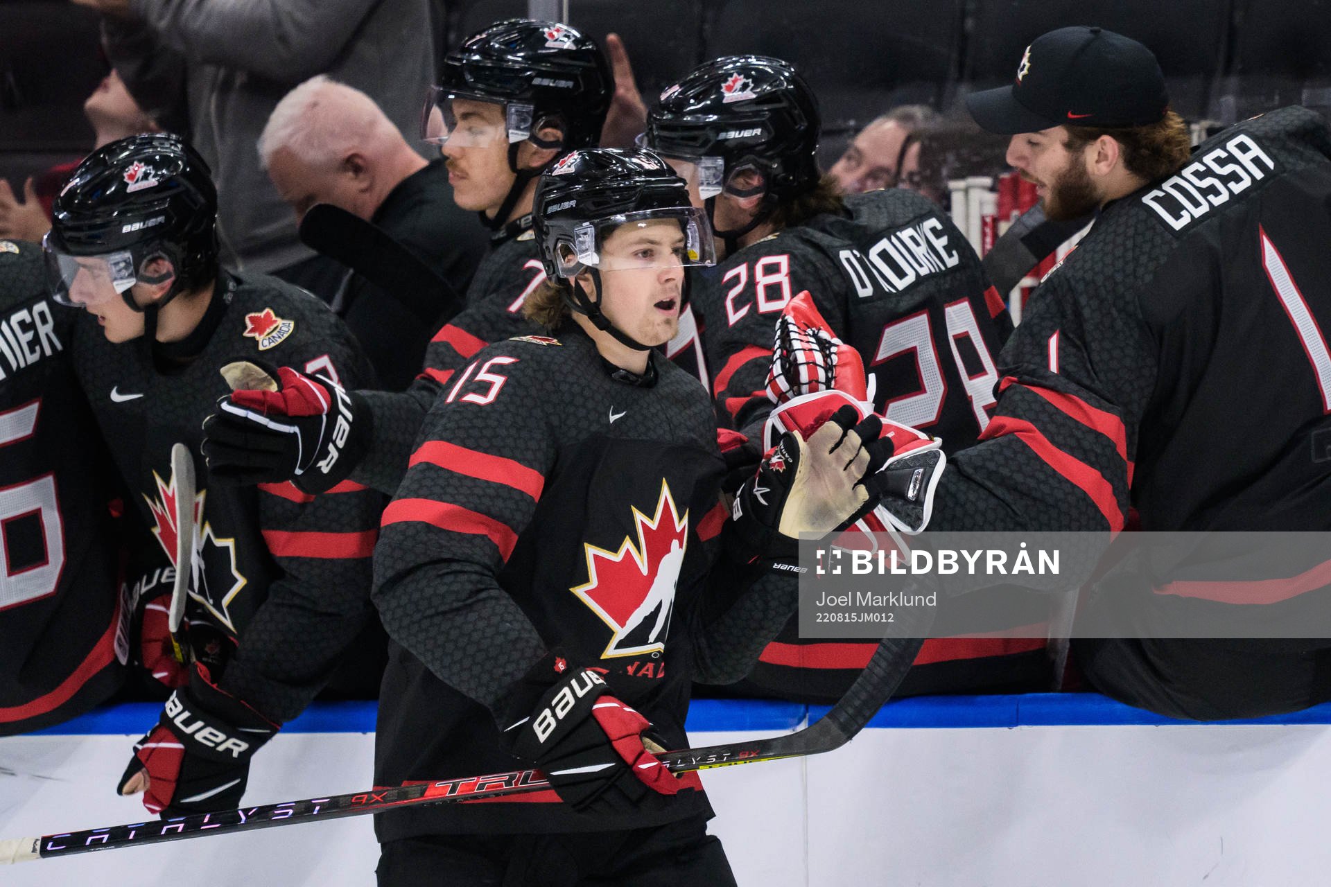 Brennan Othmann of Canada celebrates the 1-0 goal