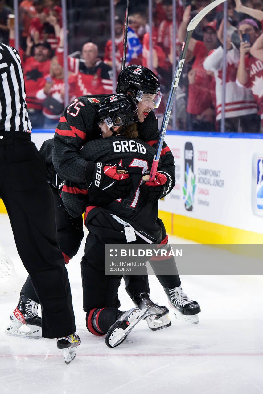William Dufour and Ridly Greig of Canada celebrate the 4-1
