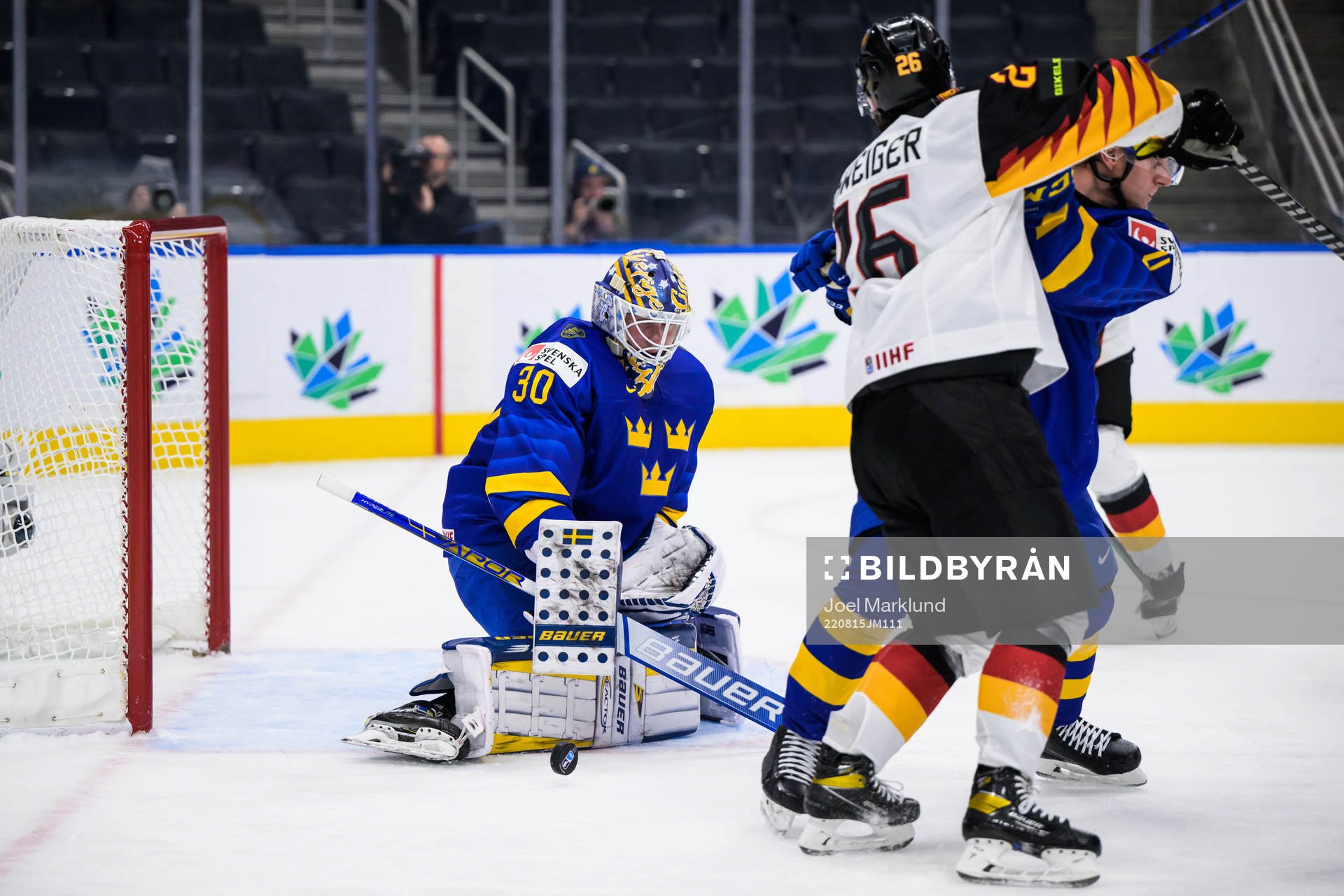 Goaltender Calle Clang of Sweden makes a save