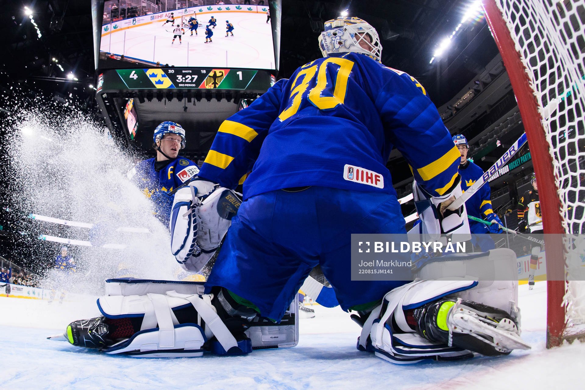 Åke Stakkestad and goaltender Calle Clang of Sweden