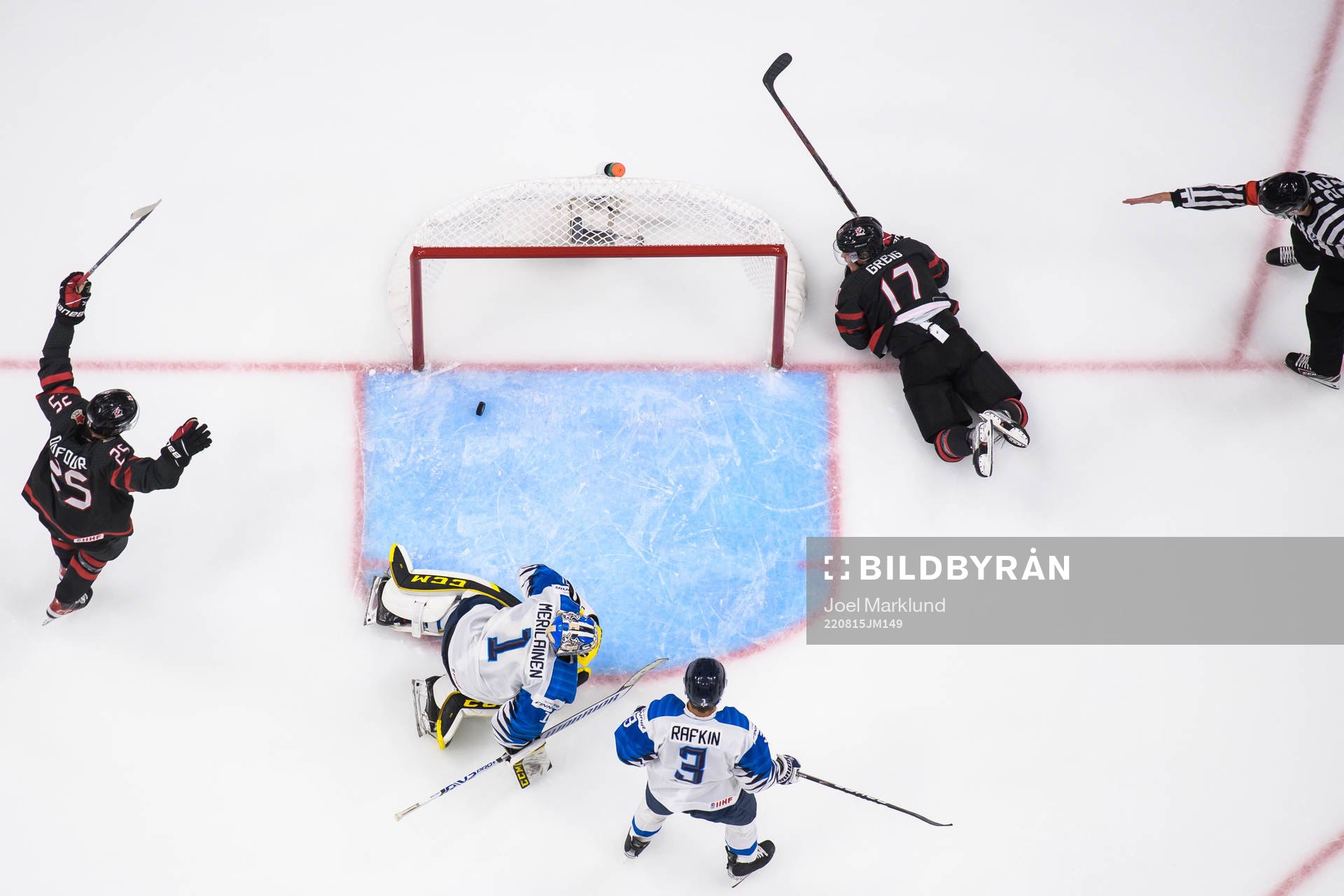 William Dufour and Ridly Greig of Canada celebrate the 4-1