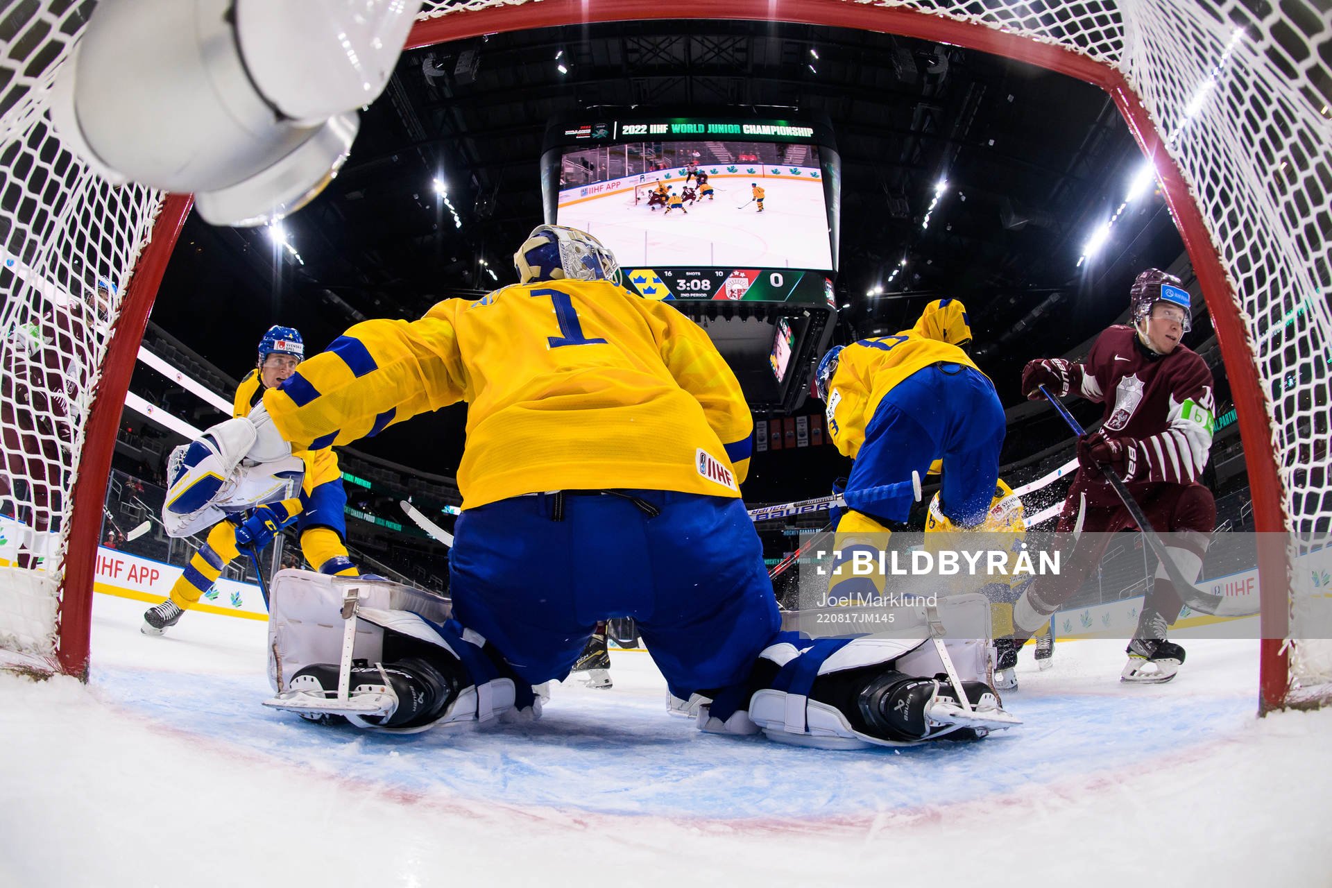 Emil Andrae, goaltender Jesper Wallstedt and Leo Lööf of