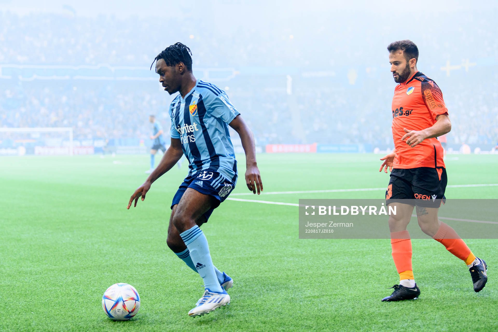 Joel Asoro of Djurgården and Franco Ariel Ferrari of Apoel during the UEFA Europa Conference League playoff match between Djurgården and Apoel on August 17, 2022 in Stockholm. 