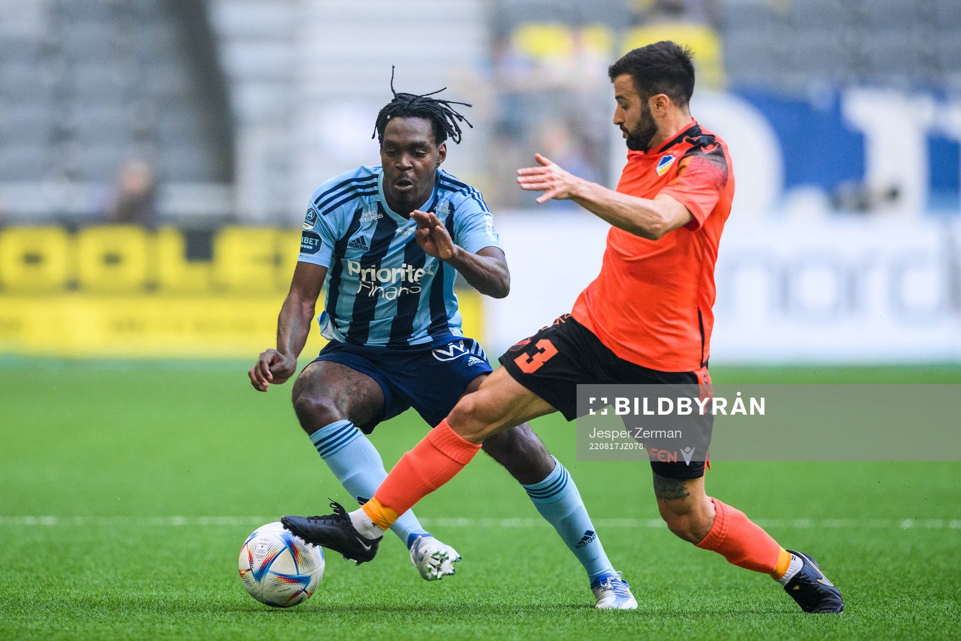 Joel Asoro of Djurgården and Franco Ariel Ferrari of Apoel during the UEFA Europa Conference League playoff match between Djurgården and Apoel on August 17, 2022 in Stockholm.