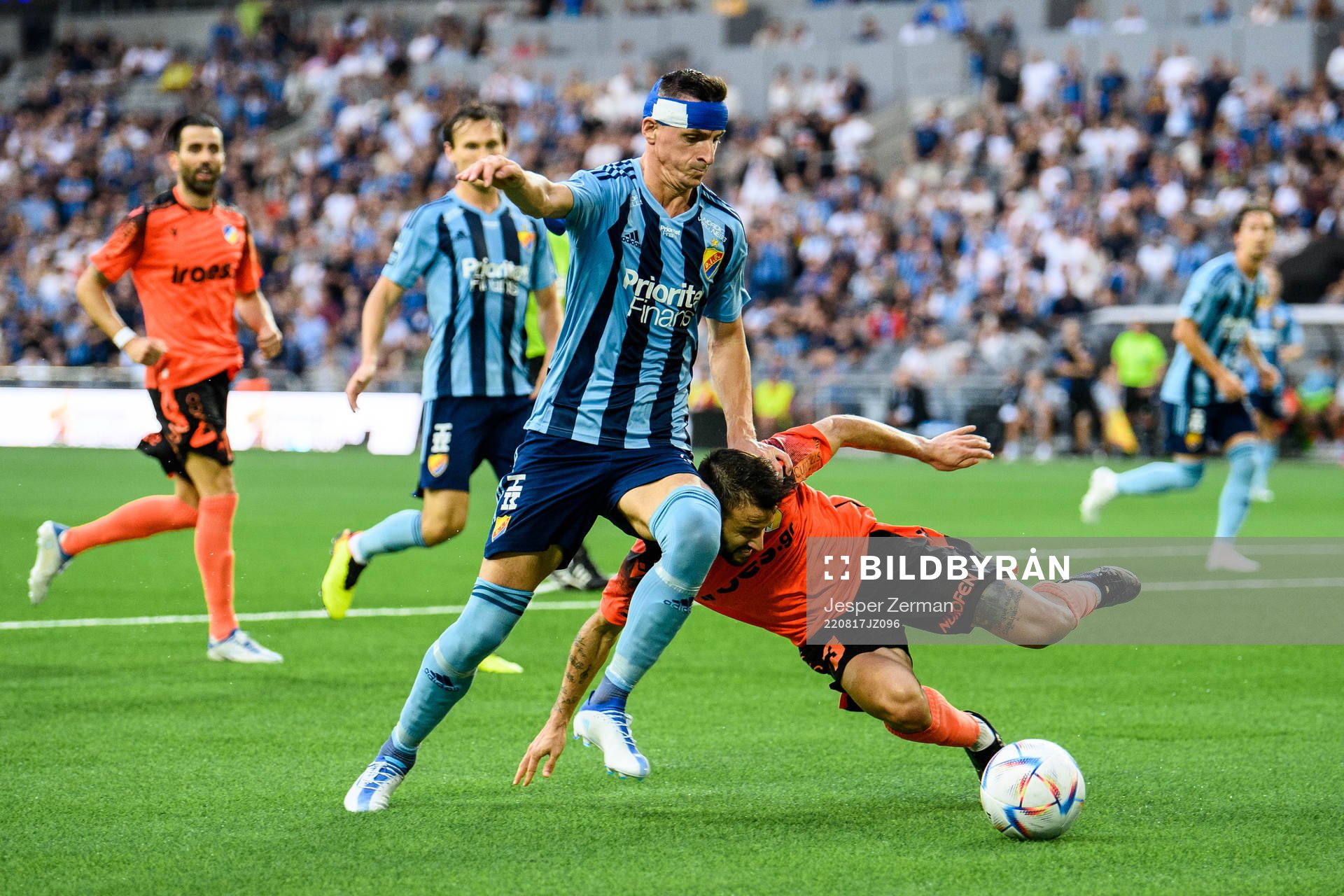 Haris Radetinac of Djurgårdenand Franco Ariel Ferrari of Apoel during the UEFA Europa Conference League playoff match between Djurgården and Apoel on August 17, 2022 in Stockholm.