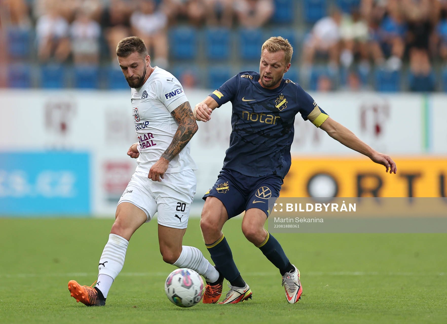 Marek Havlik of Slovacko and Sebastian Larsson of AIK