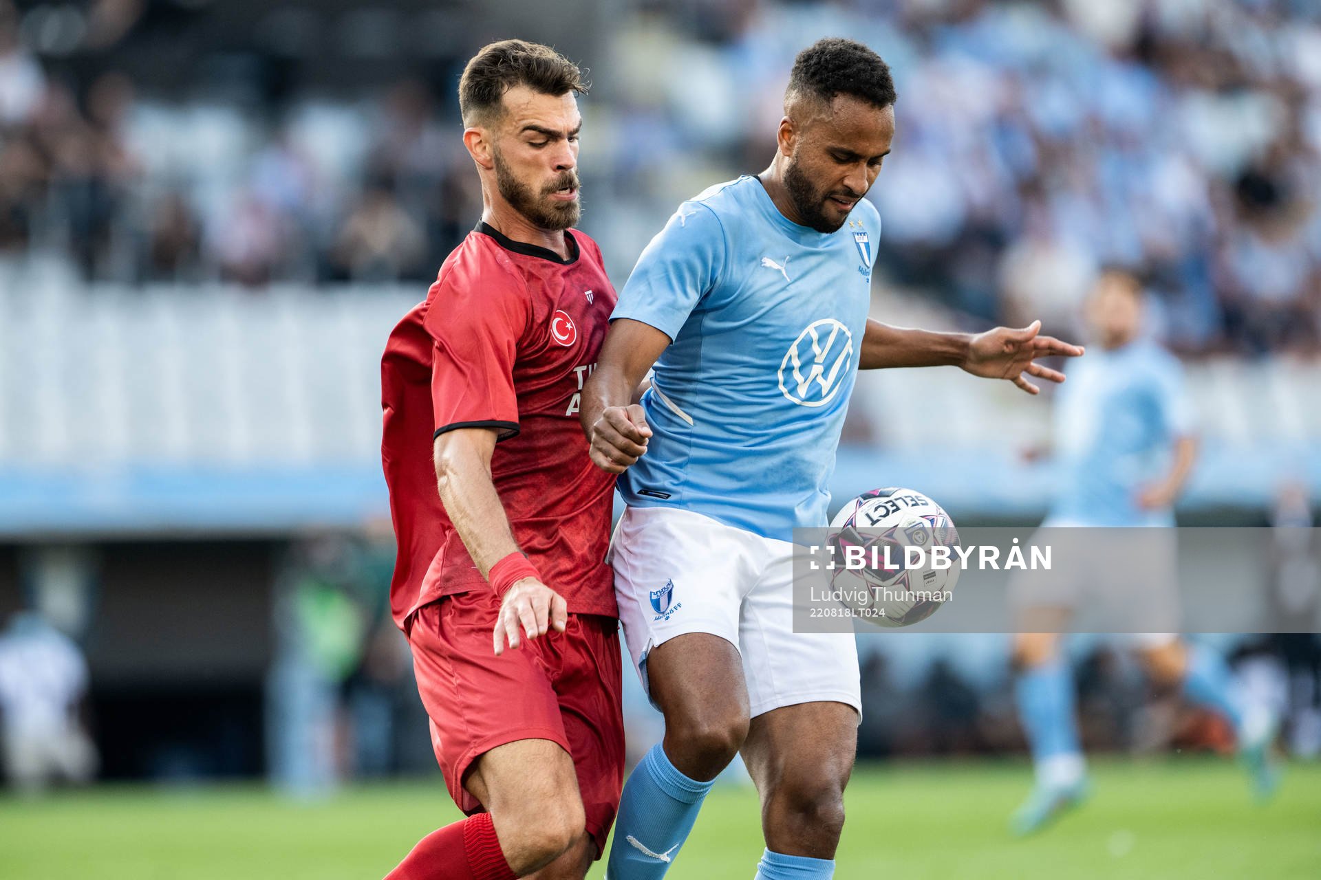 Isaac Kiese Thelin of Malmö FF and Dimitris Goutas of