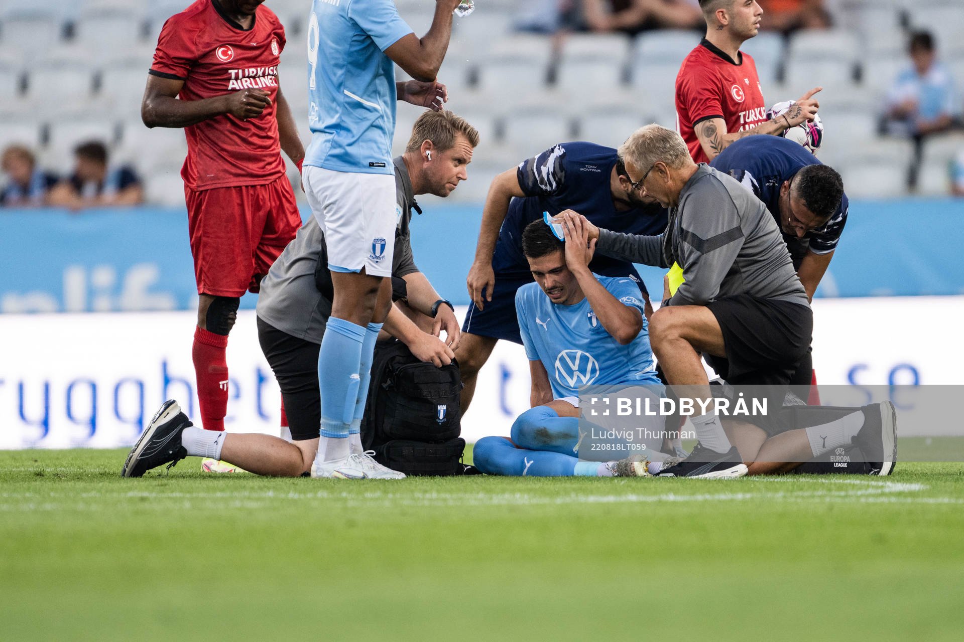 Dennis Hadzikadunic of Malmö FF receives medical treatment