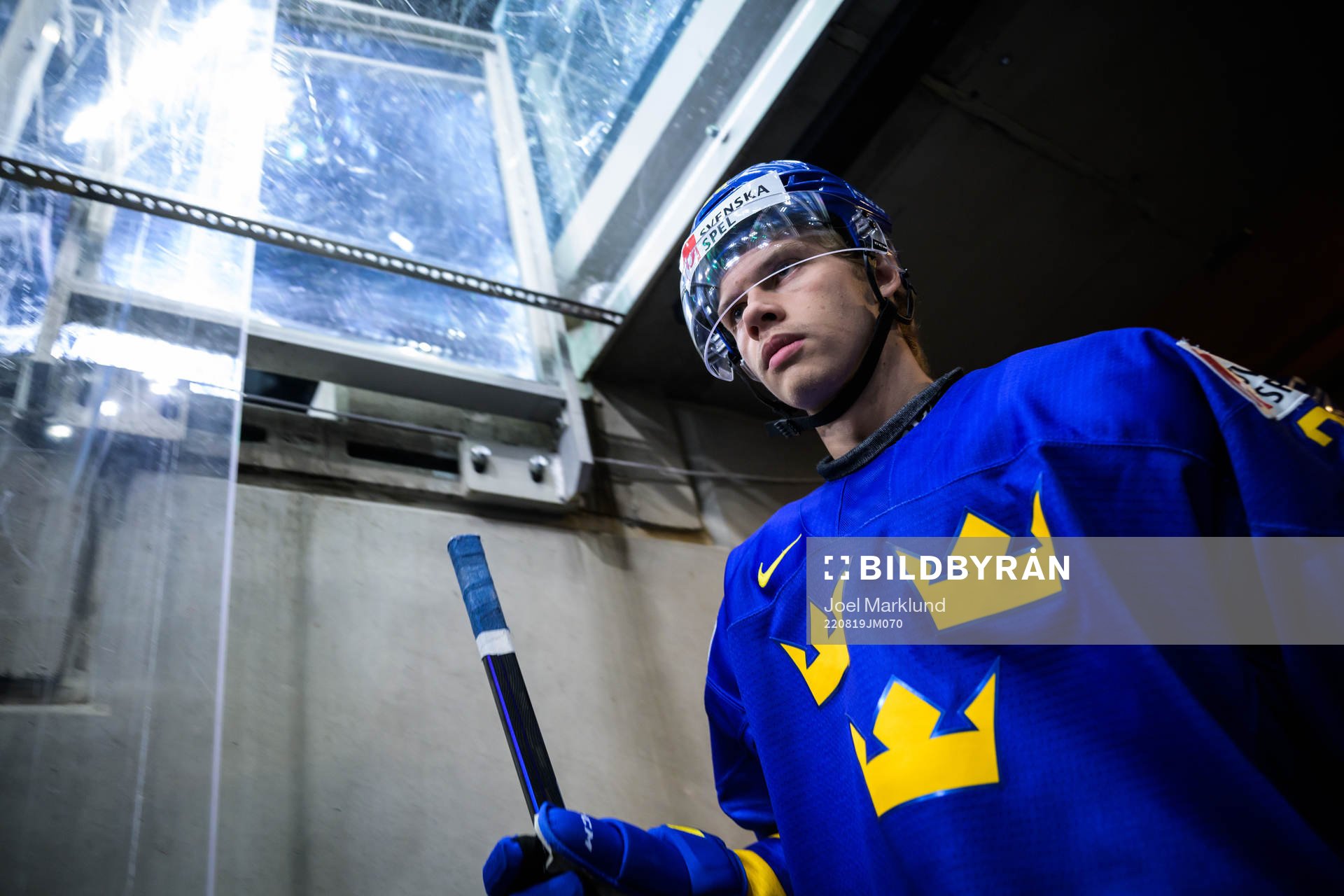 Albert Sjöberg of Sweden walks out to the ice for warm-up