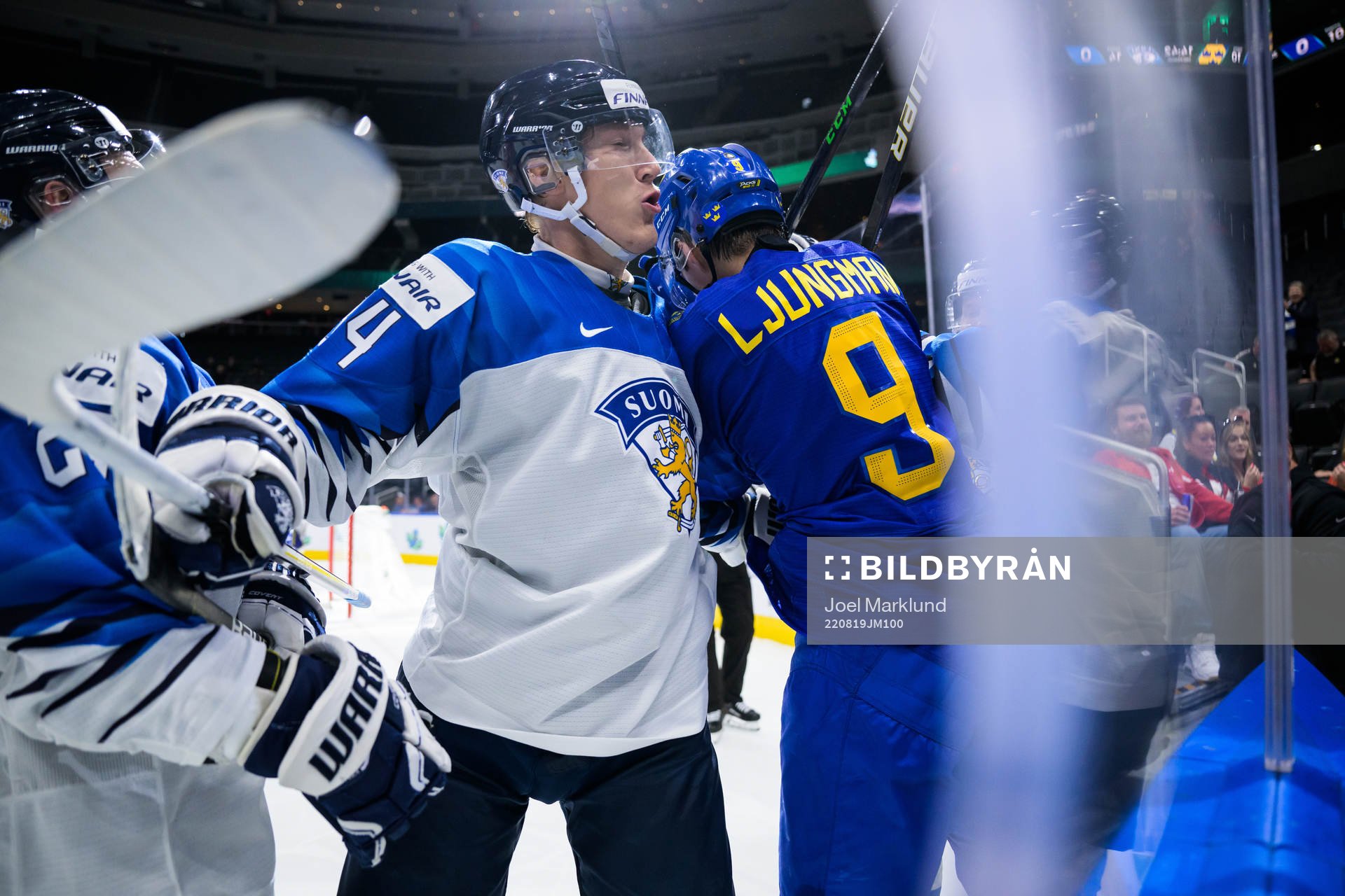Aatu Räty of Finland tackles Daniel Ljungman of Sweden
