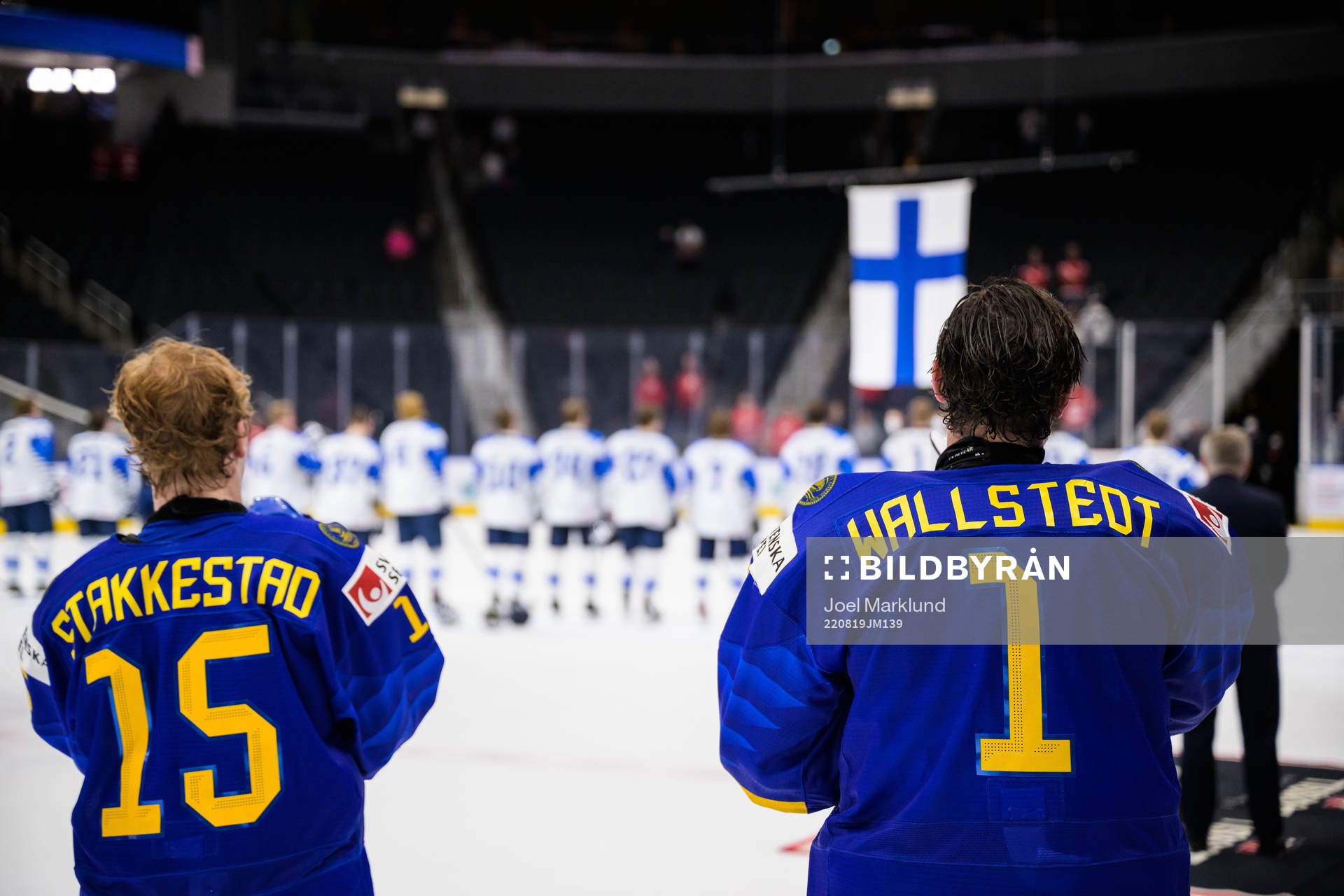 Åke Stakkestad and goaltender Jesper Wallstedt of Sweden