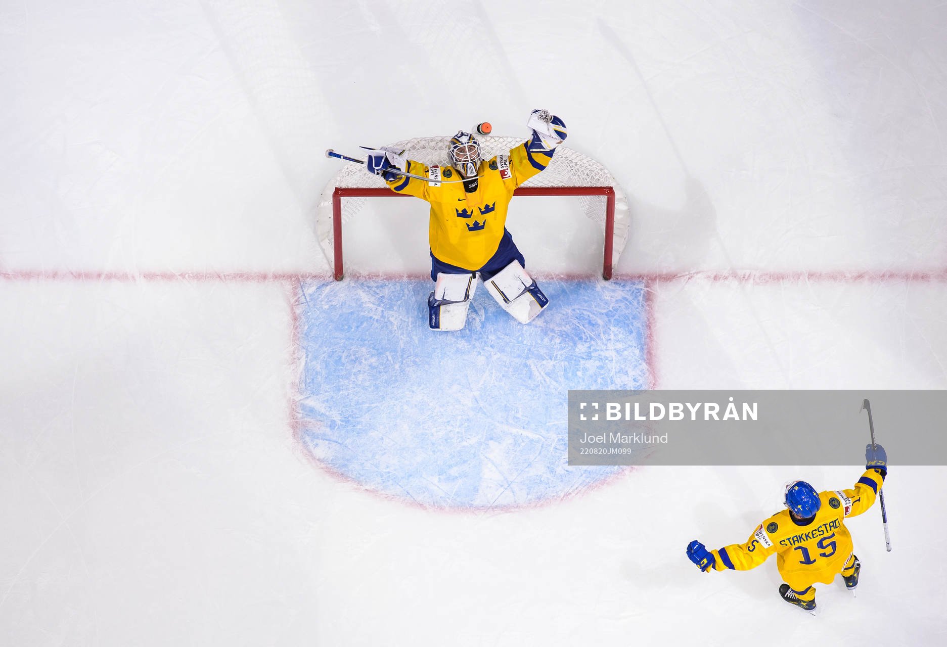 Goaltender Jesper Wallstedt and Åke Stakkestad of Sweden