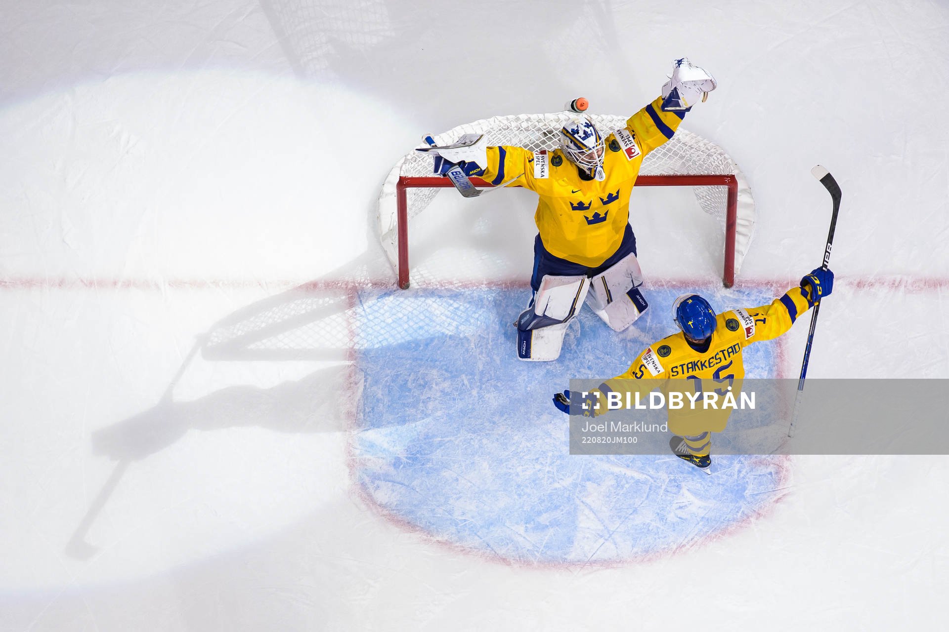 Goaltender Jesper Wallstedt and Åke Stakkestad of Sweden