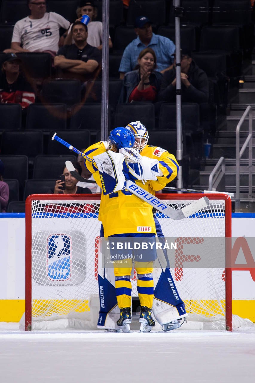 Goaltender Jesper Wallstedt and Åke Stakkestad of Sweden
