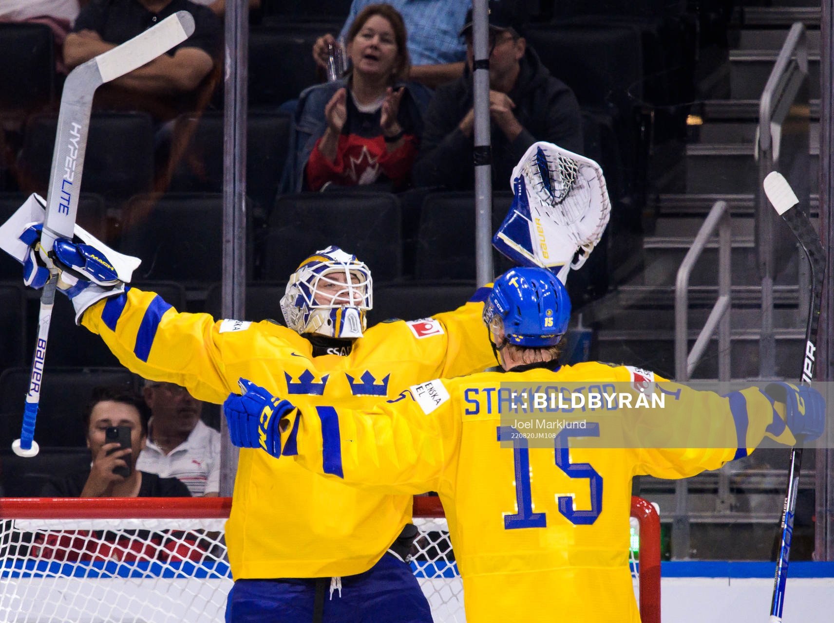 Goaltender Jesper Wallstedt and Åke Stakkestad of Sweden