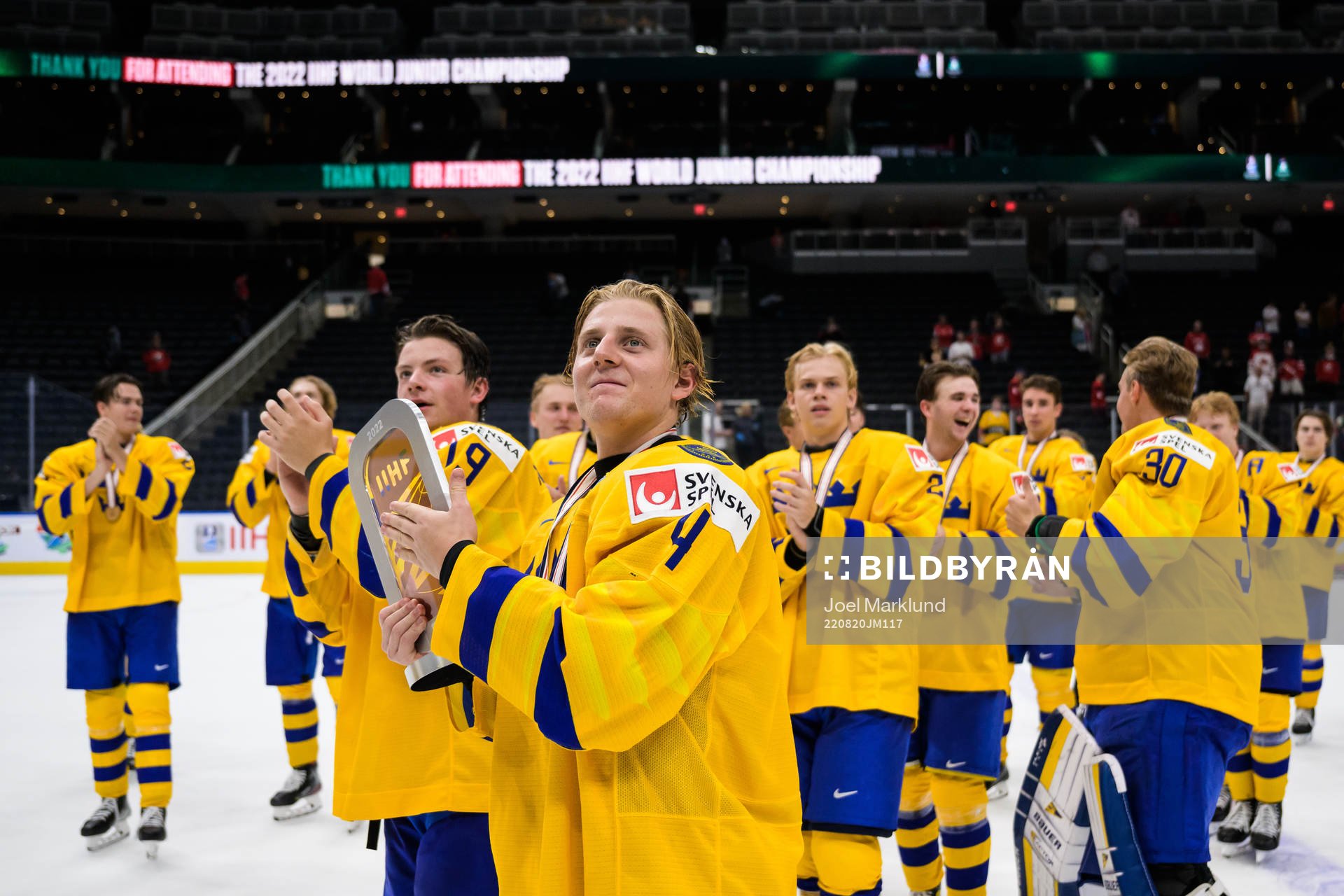Emil Andrae of Sweden with the bronze trophy