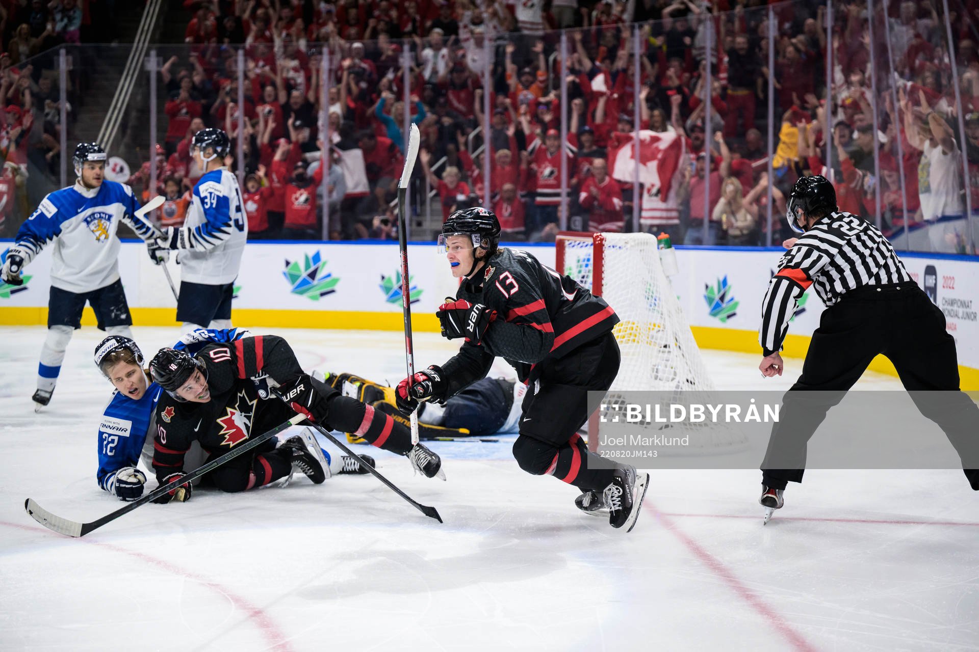 Kent Johnson of Canada celebrates