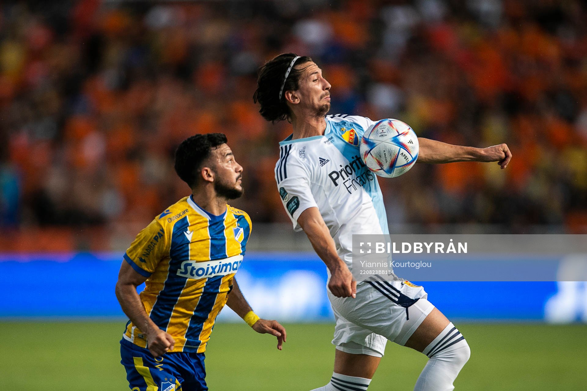 Giannis Satsias of Apoel and Gustav Wikheim of Djurgården during the UEFA Conference League playoff match between Apoel and Djurgården on August 23, 2022 in Strovolos.