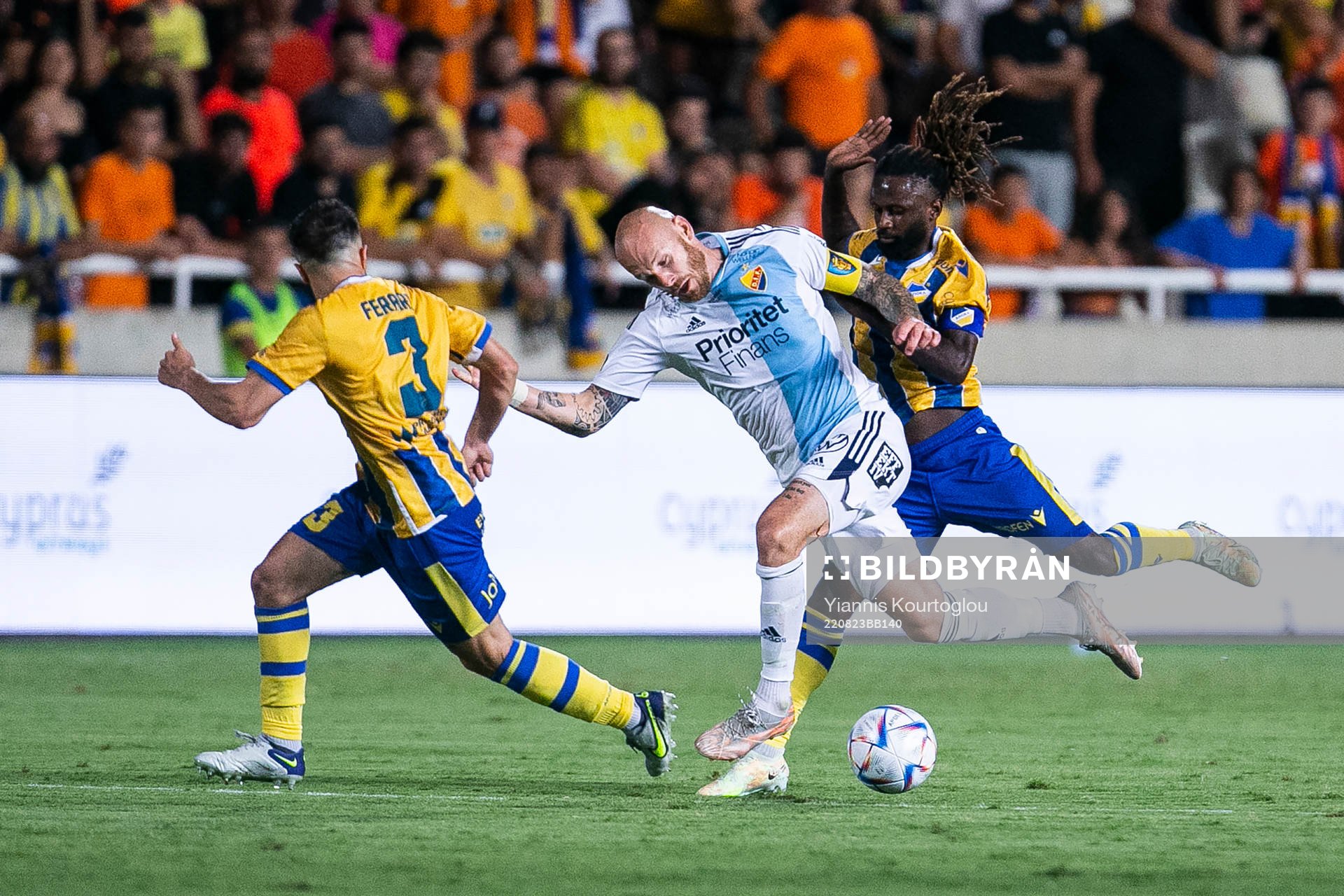 Franco Ariel Ferrari and Dieumerci Ndongala of Apoel and Magnus Eriksson of Djurgården during the UEFA Conference League playoff match between Apoel and Djurgården on August 23, 2022 in Strovolos.
