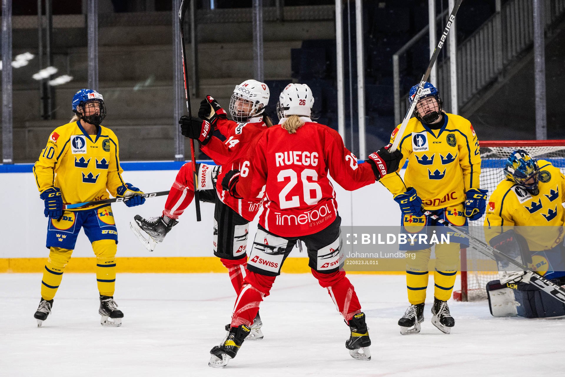 Evelina Raselli of Switzerland celebrates scoring 1-1