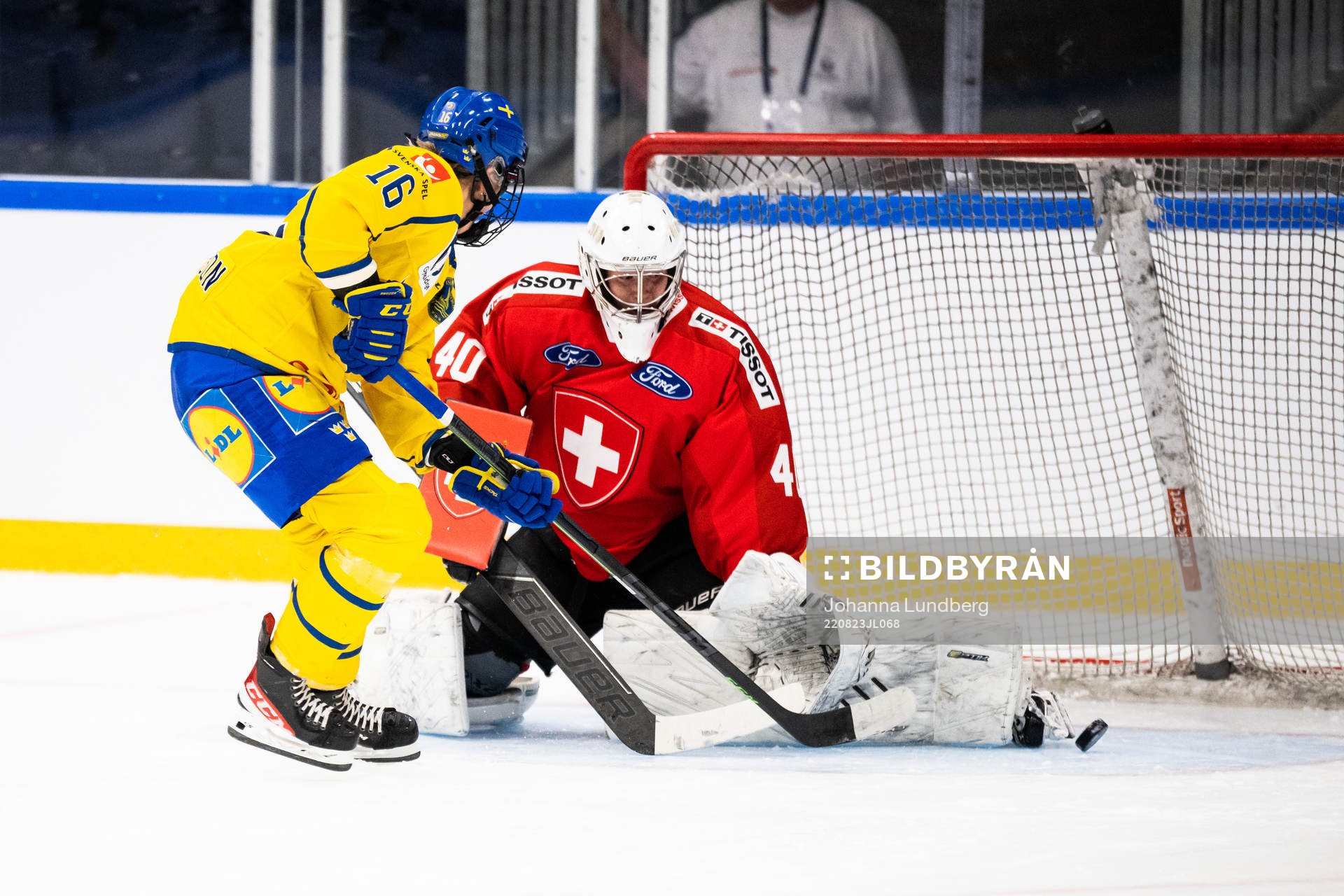 Linnea Johansson of Sweden and goaltender Alexandra Lehmann
