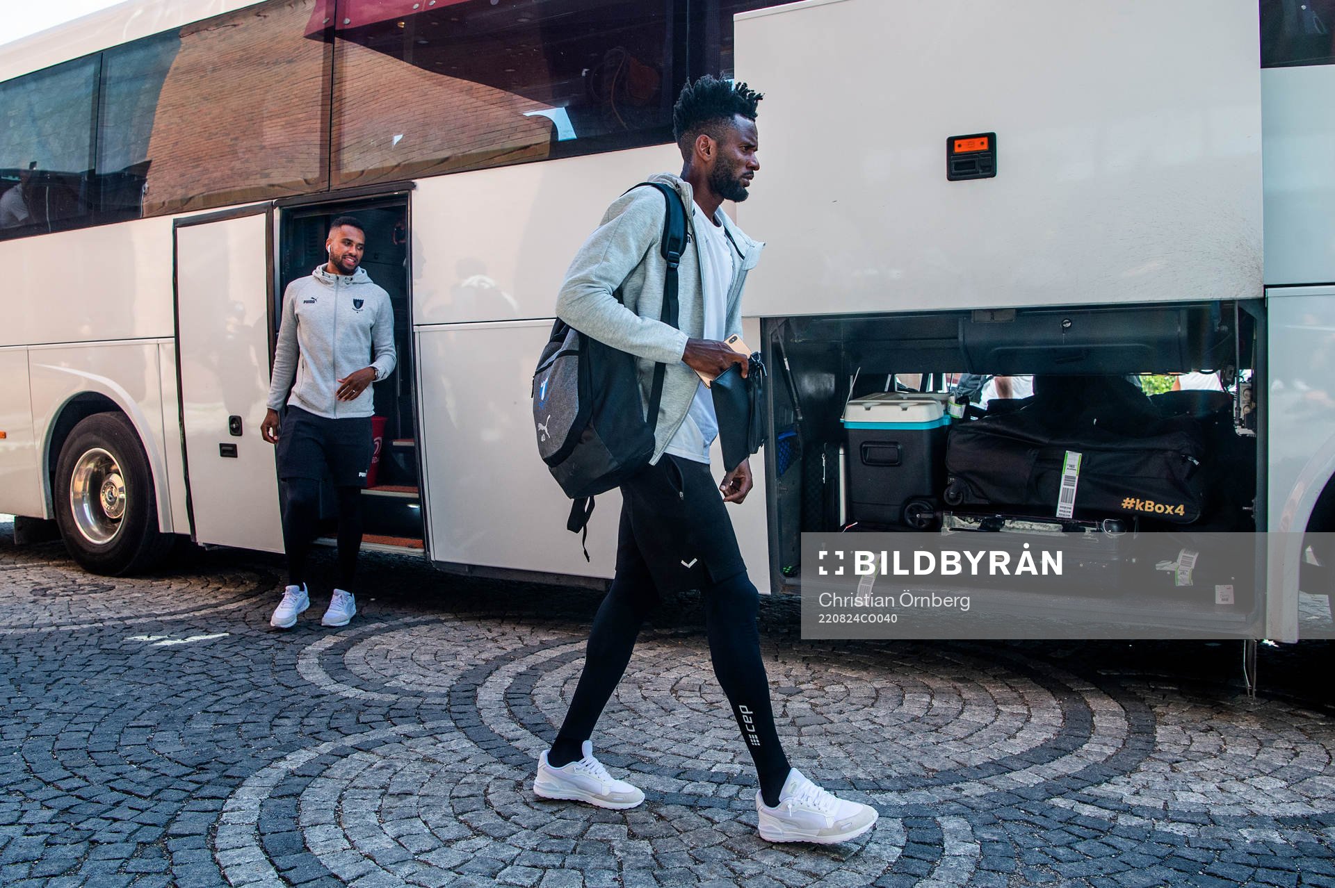 Emmanuel Lomotey and Isaac Kiese Thelin during the team travel from Malmö to Sivas ahead of Europa League Play-off match on August 24, 2022 in Malmö.