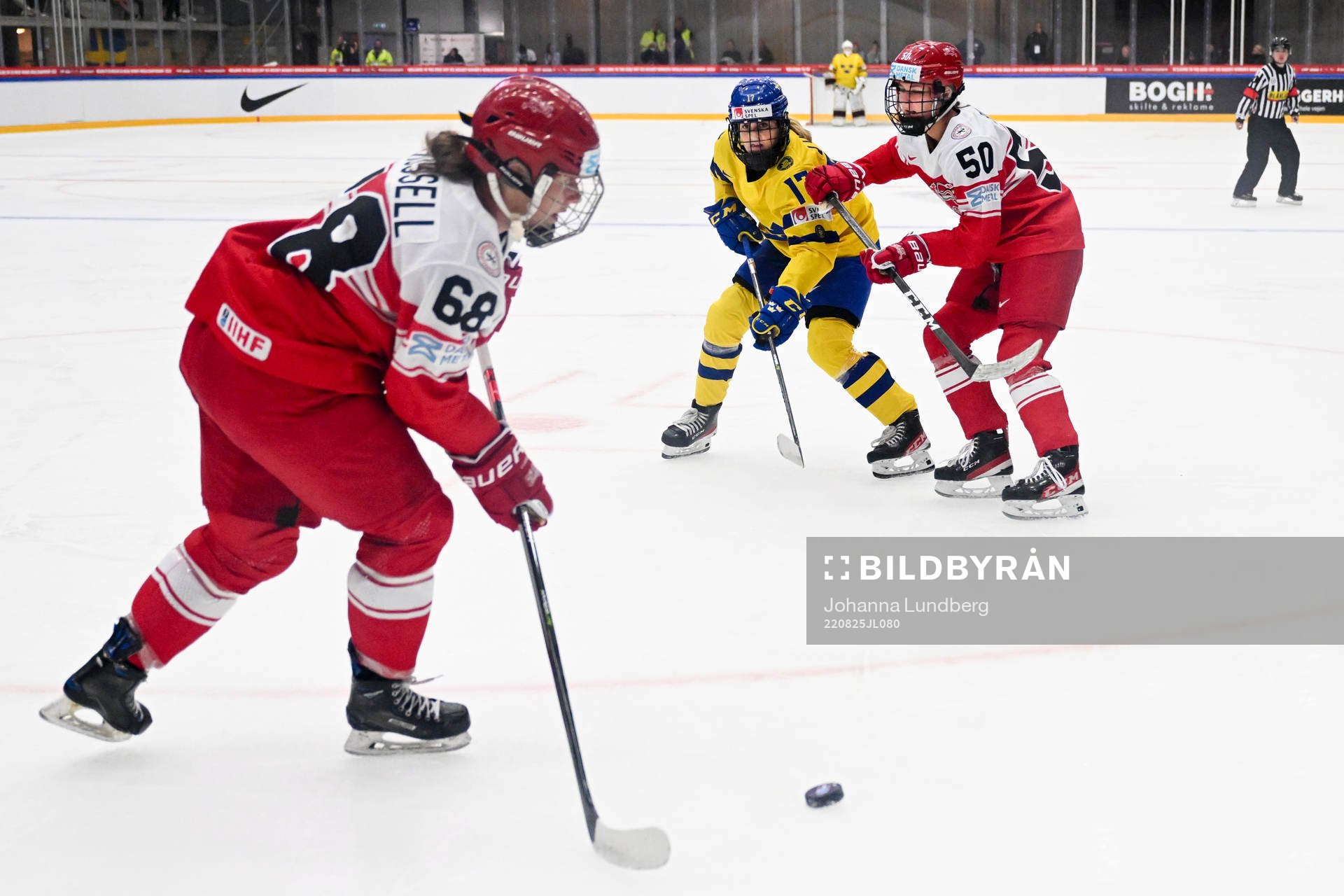 Sofie Lundin of Sweden agains Emma Russell and Mia Bau of