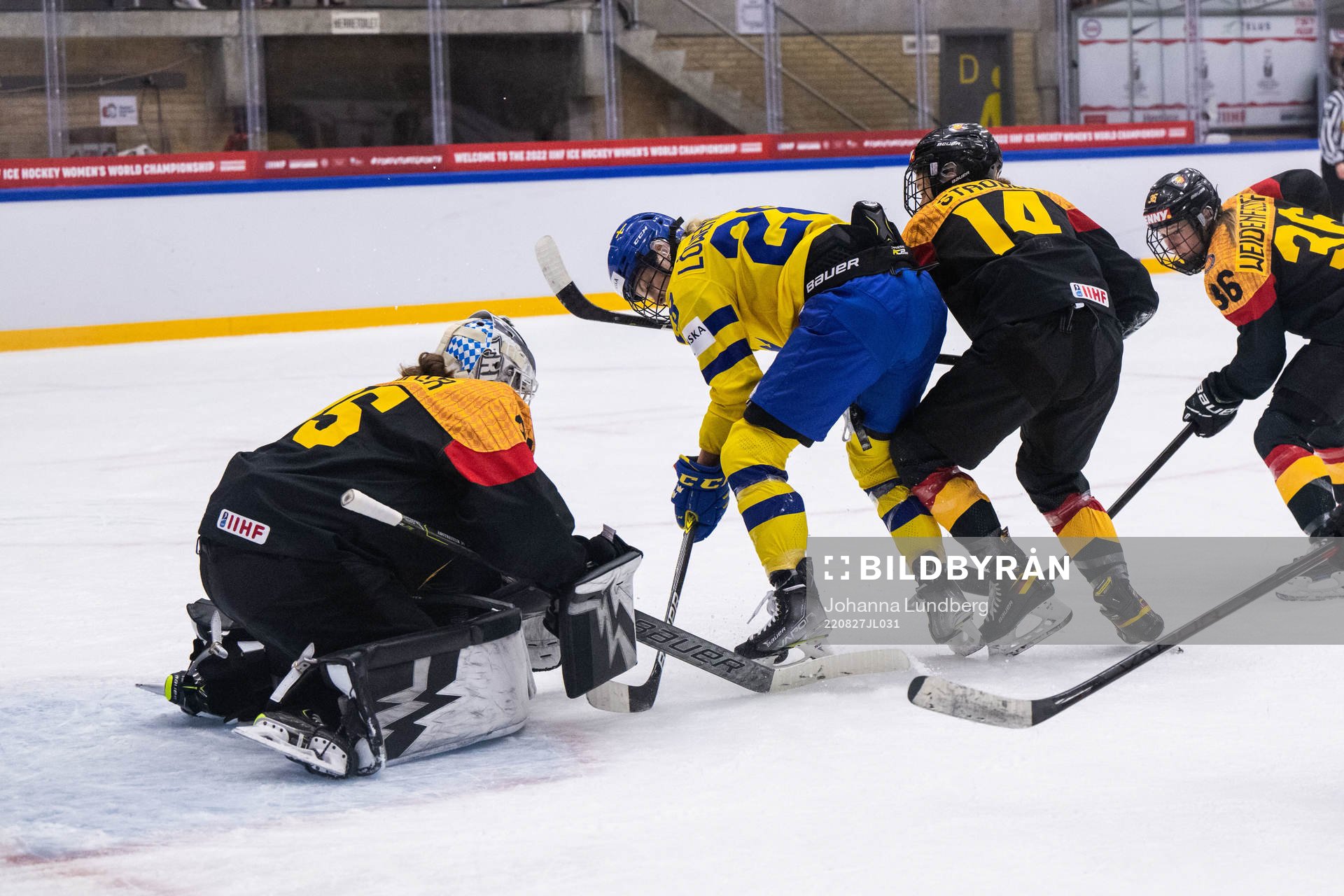goaltender Sandra Abstreiter, Carina Strobel of Germany and