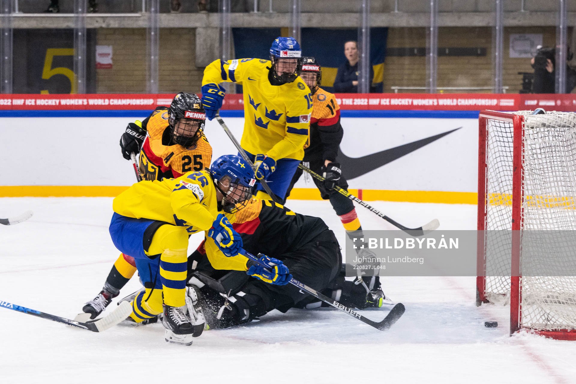 Hanna Olsson of Sweden scores 2-0 behind goaltender Sandra
