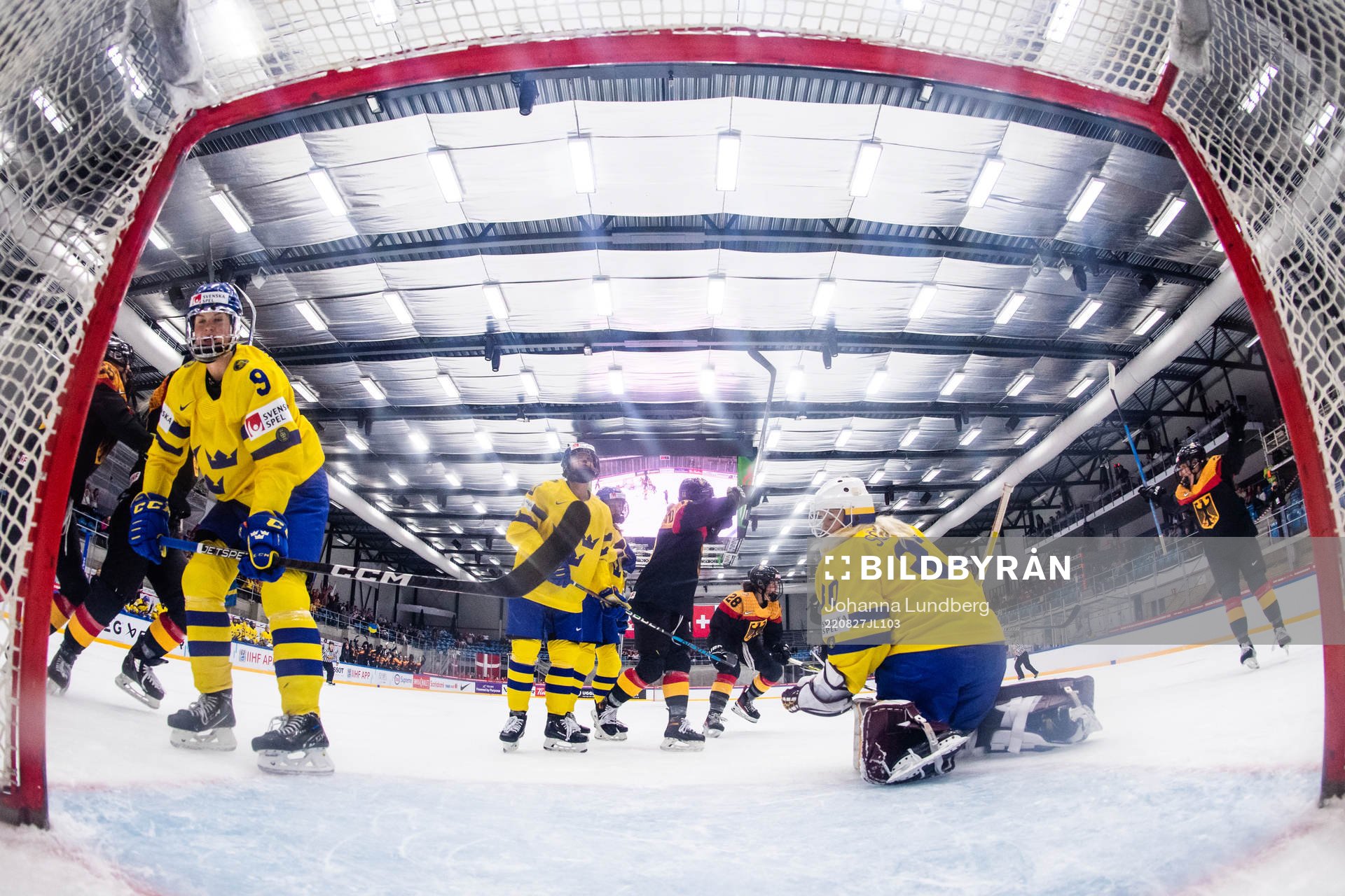 Jessica Adolfsson and goaltender Emma Söderberg of Sweden