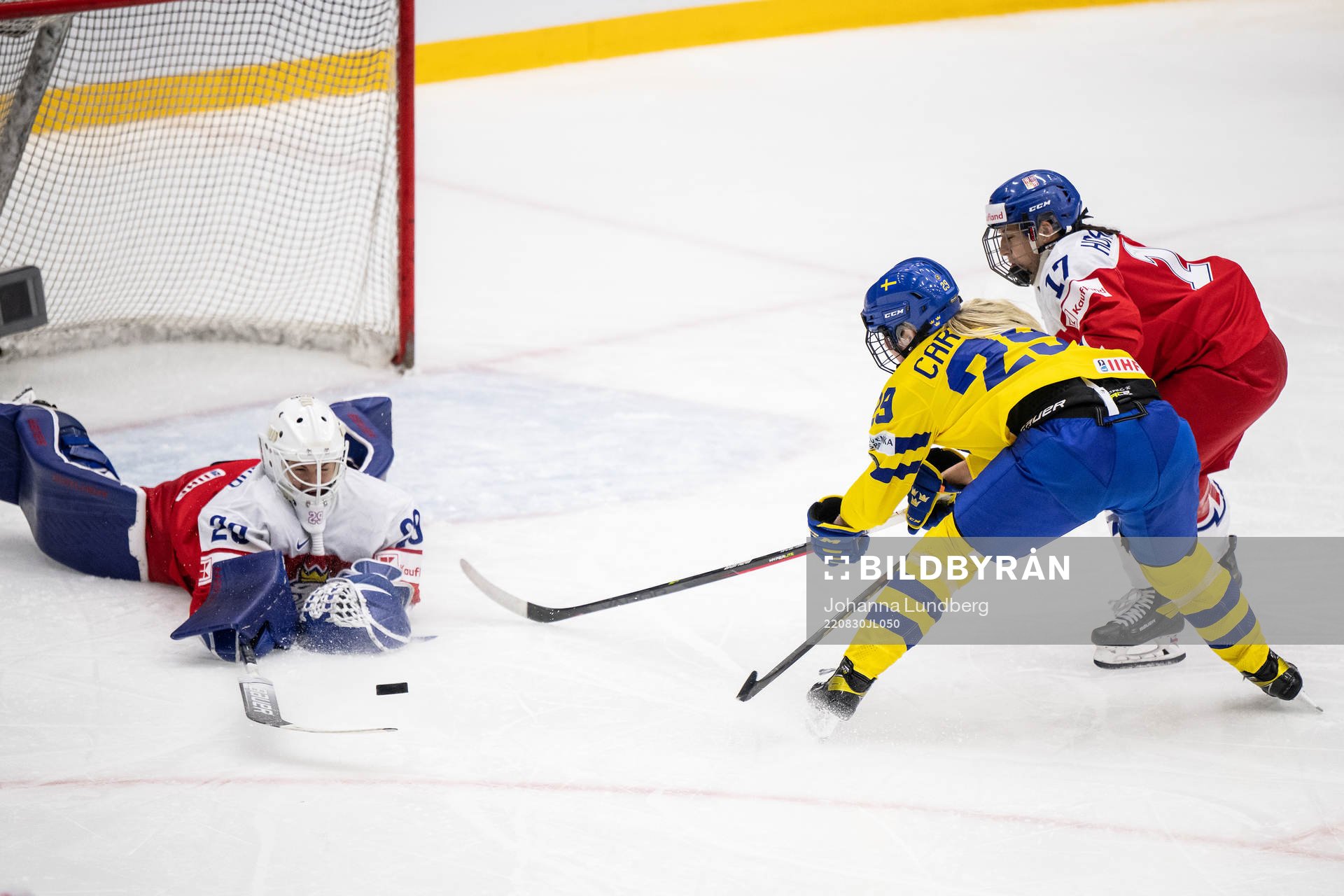 goaltender Klara Peslarova and Pavlina Horalkova of Czech
