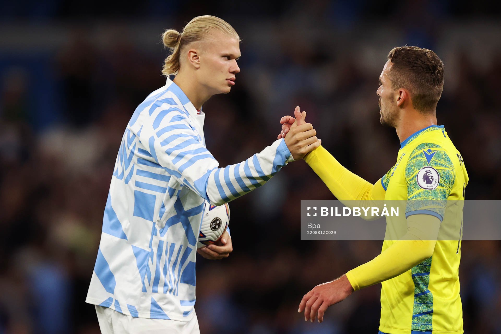 Erling Braut Haaland of Manchester City and Harry Toffolo