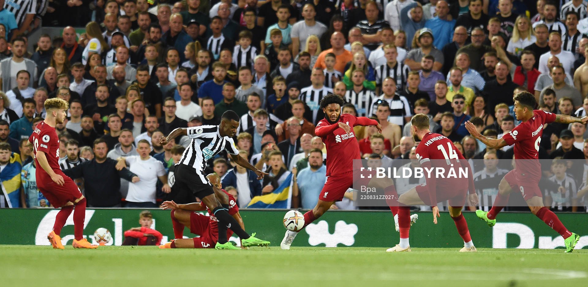 Alexander Isak of Newcastle United and Joe Gomez and