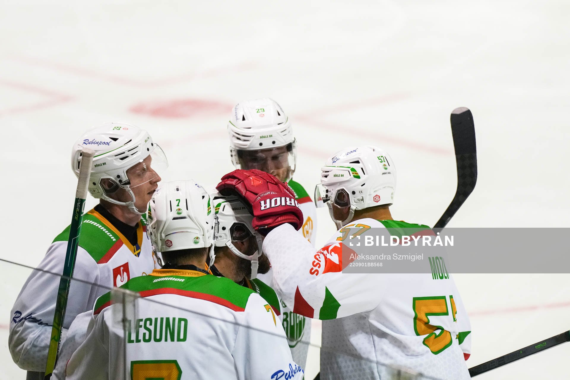 Riley Sheen of Rögle celebrate with team mates