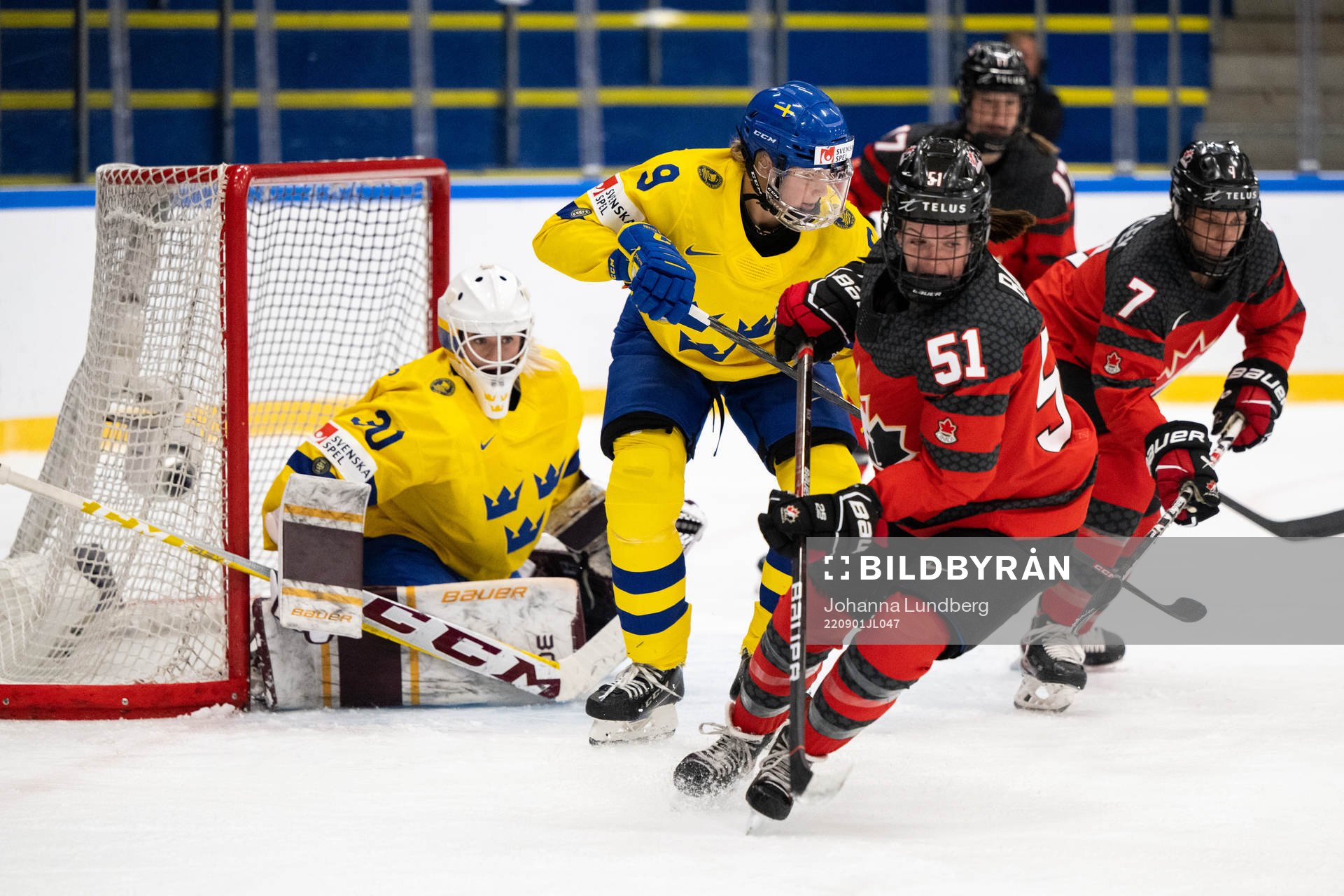 Goaltender Emma Söderberg, Jessica Adolfsson of Sweden and