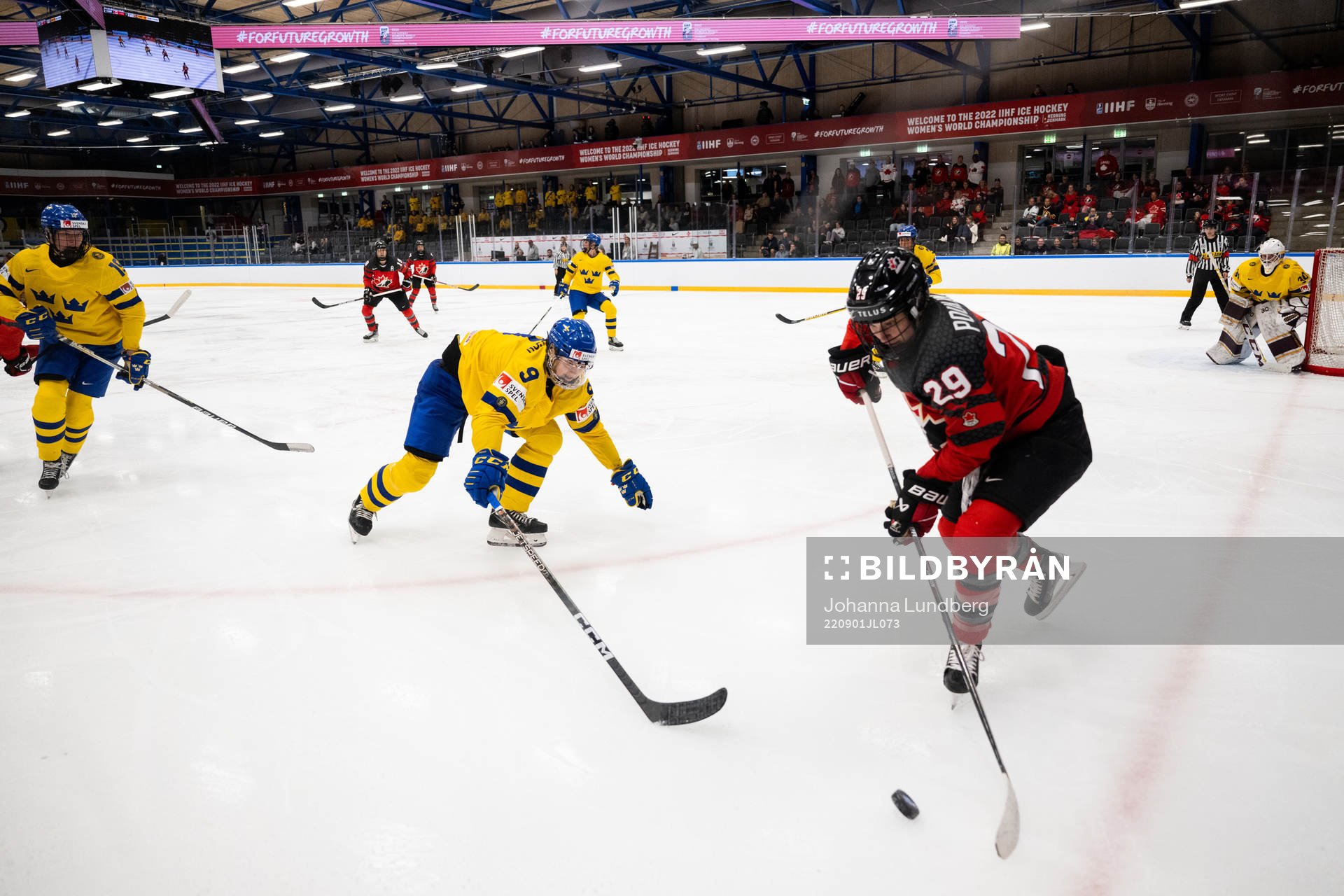 Jessica Adolfsson of Sweden and Marie-Philip Poulin of