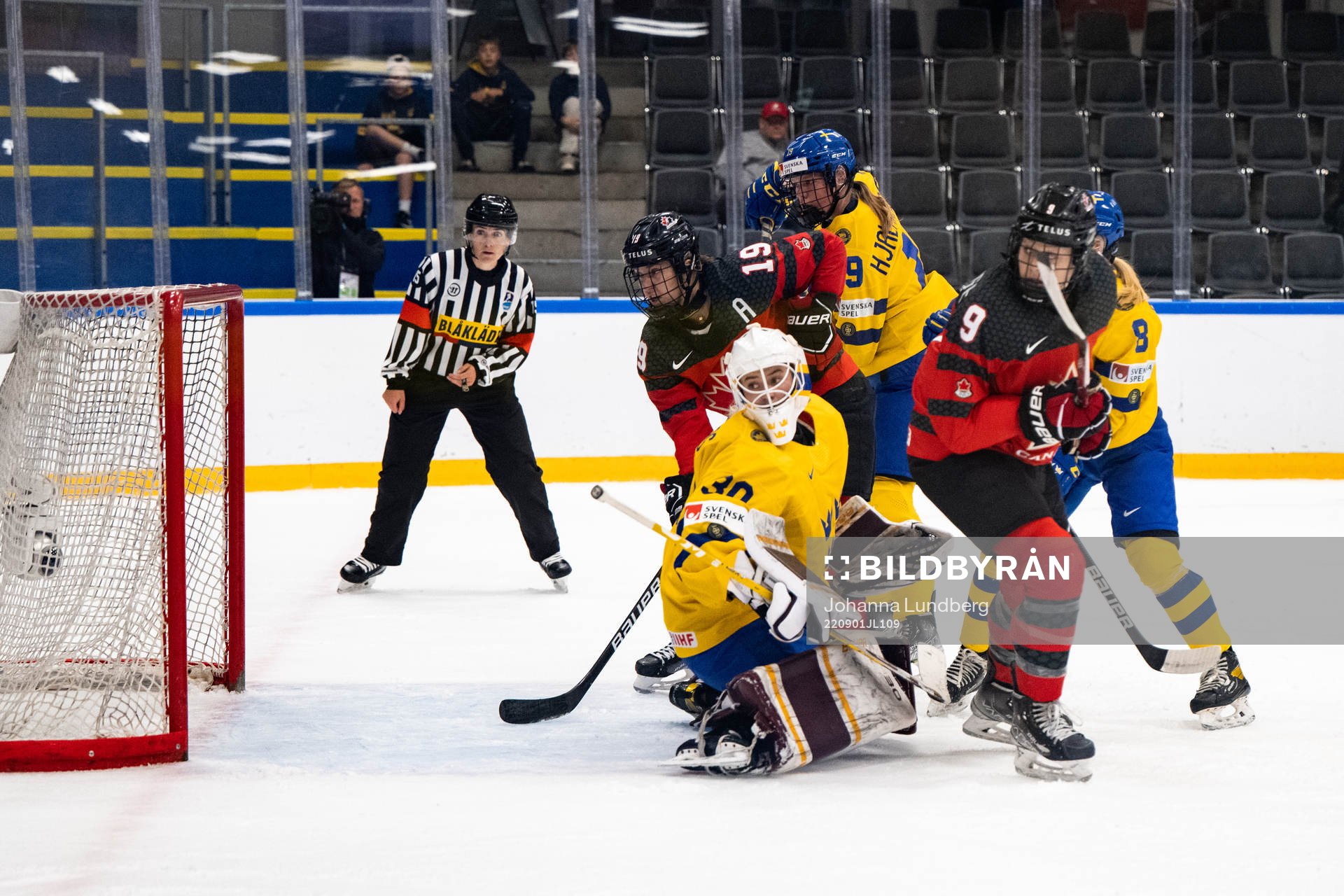 Goaltender Emma Söderberg of Sweden and Brianne Jenner and
