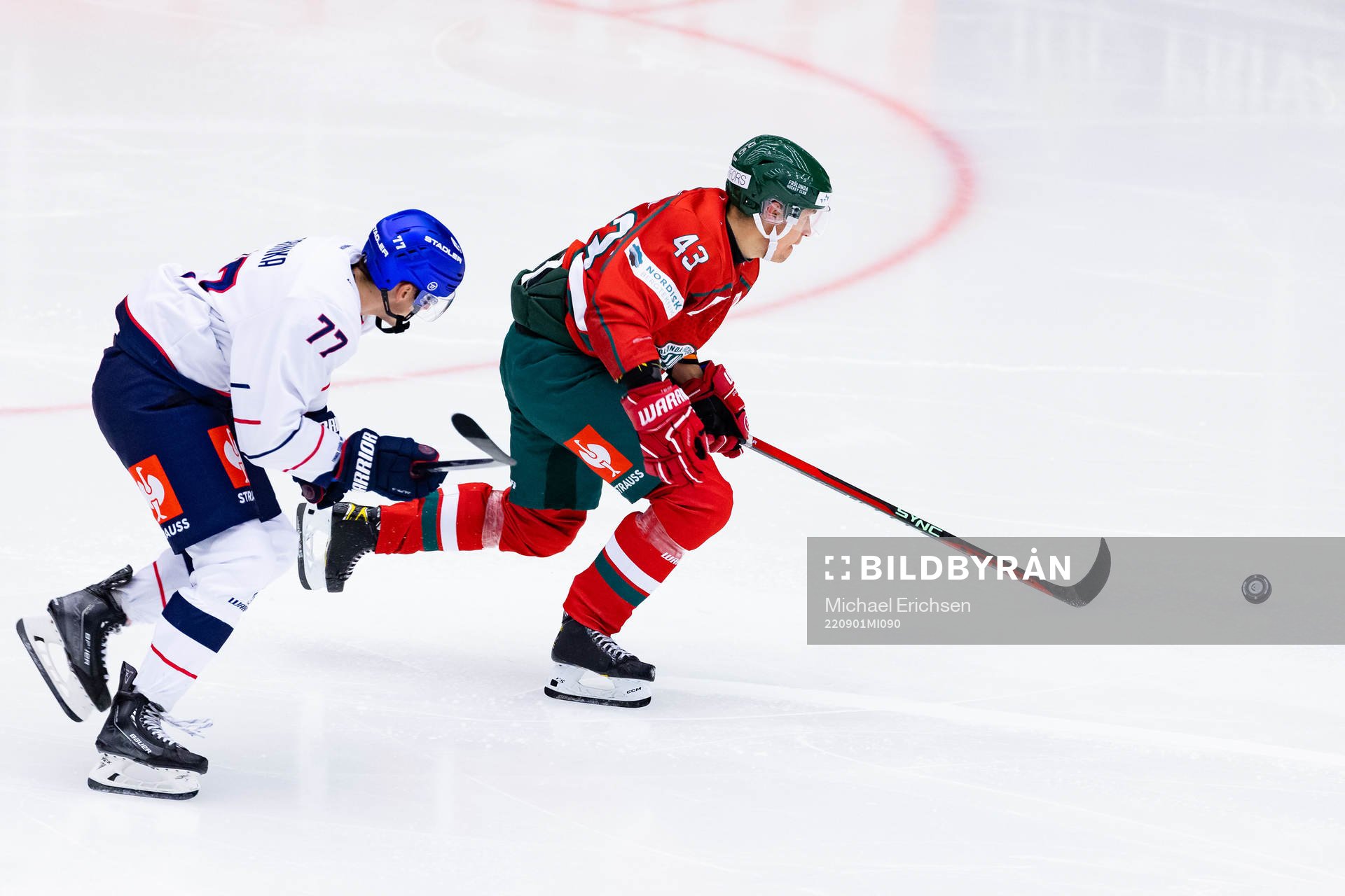 Marcel Barinka of Eisbären Berlin and Tom Nilsson  of