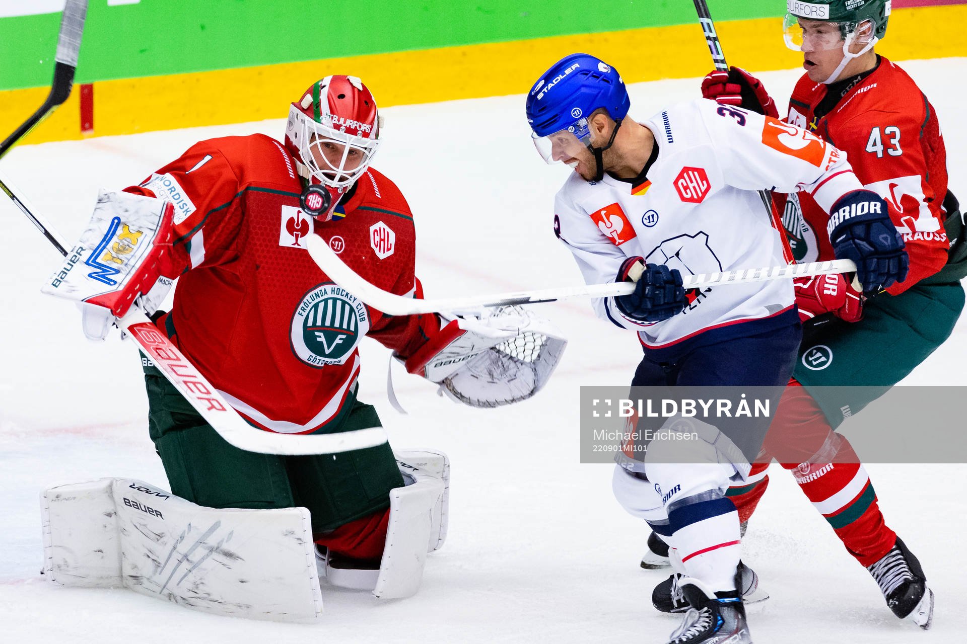 Goalkeeper Lars Johansson of Frölunda and Kevin Clark of
