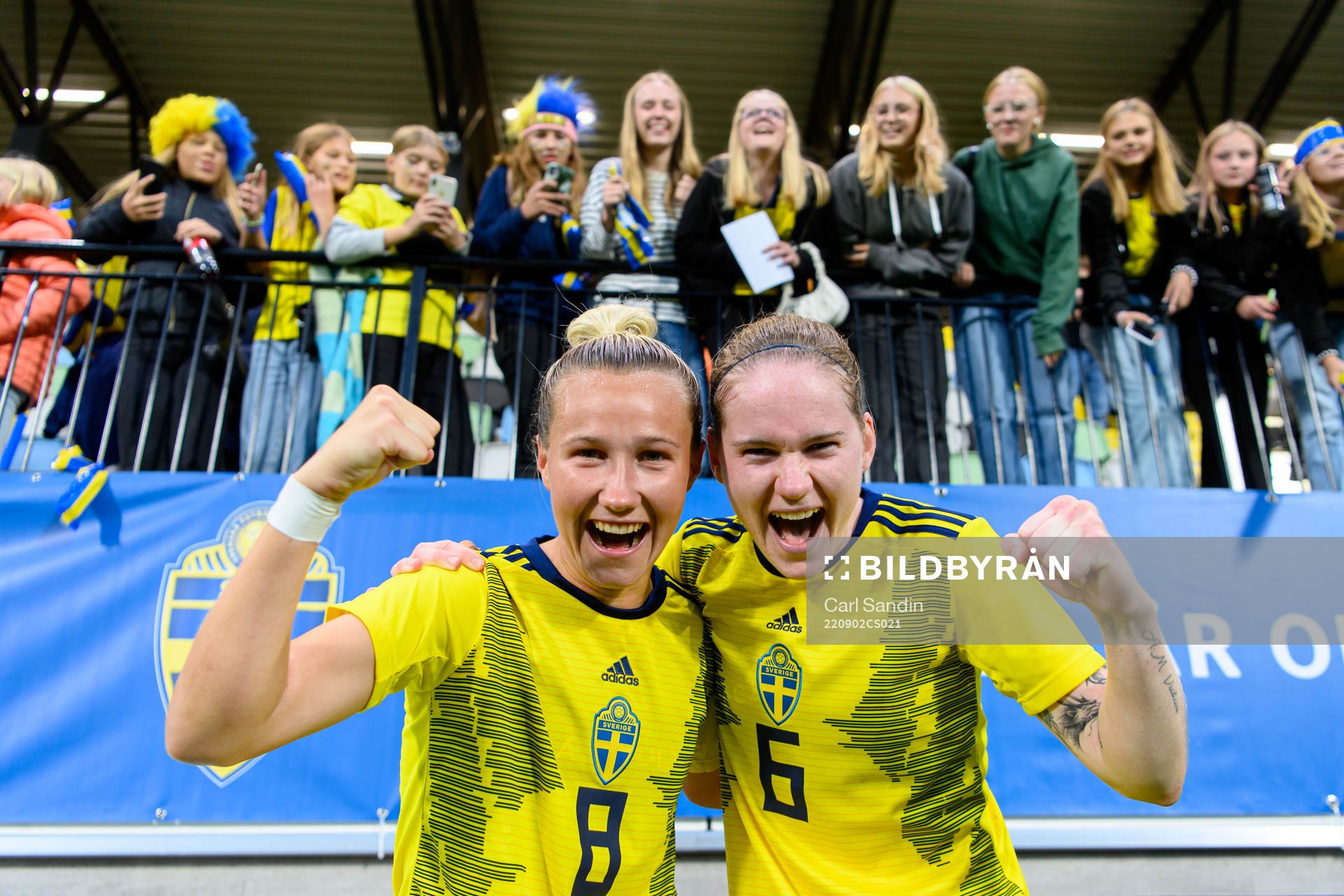 Marika Bergman Lundin and Linn Vickius of Sweden celebrate