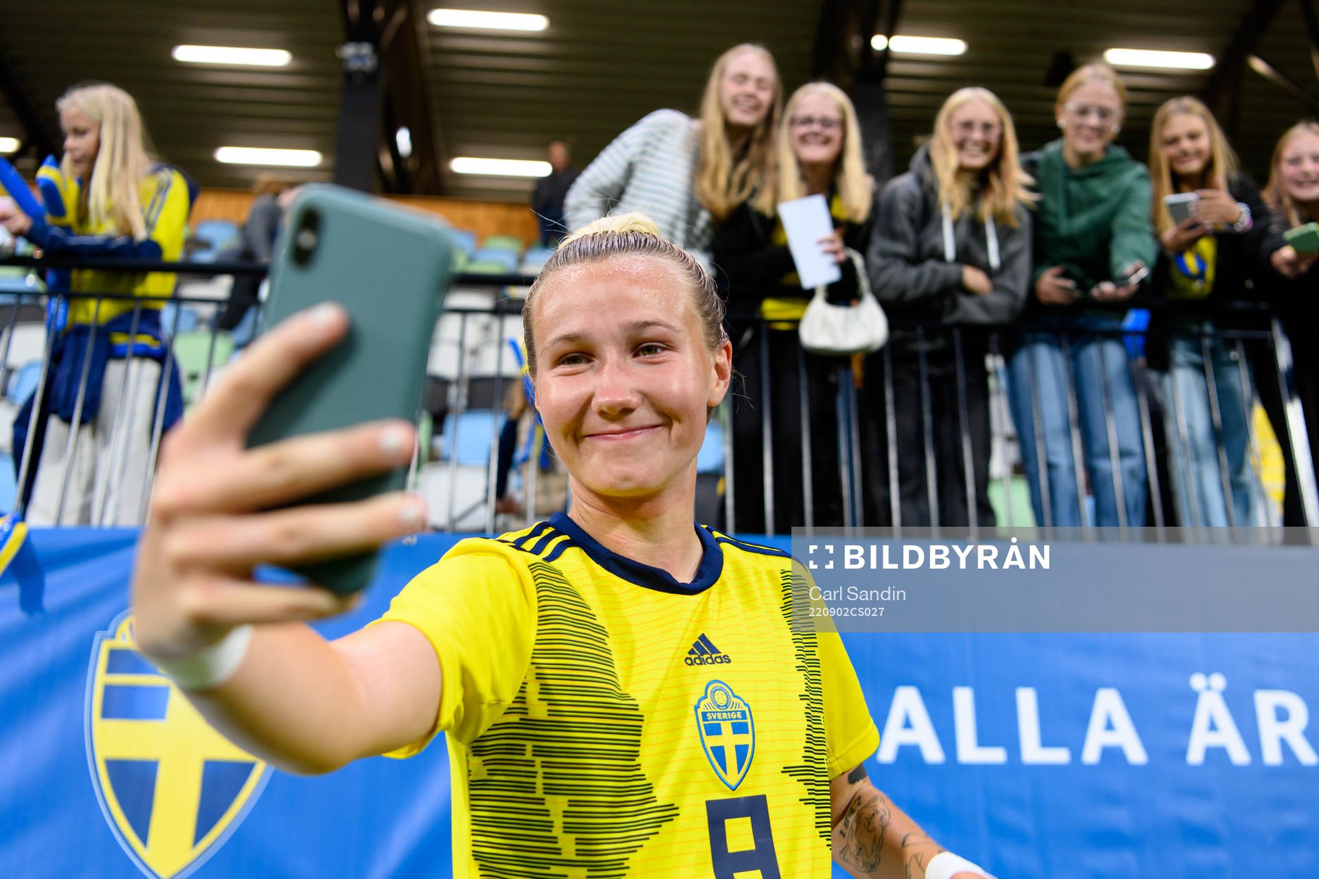 Marika Bergman Lundin of Sweden takes pictures with the
