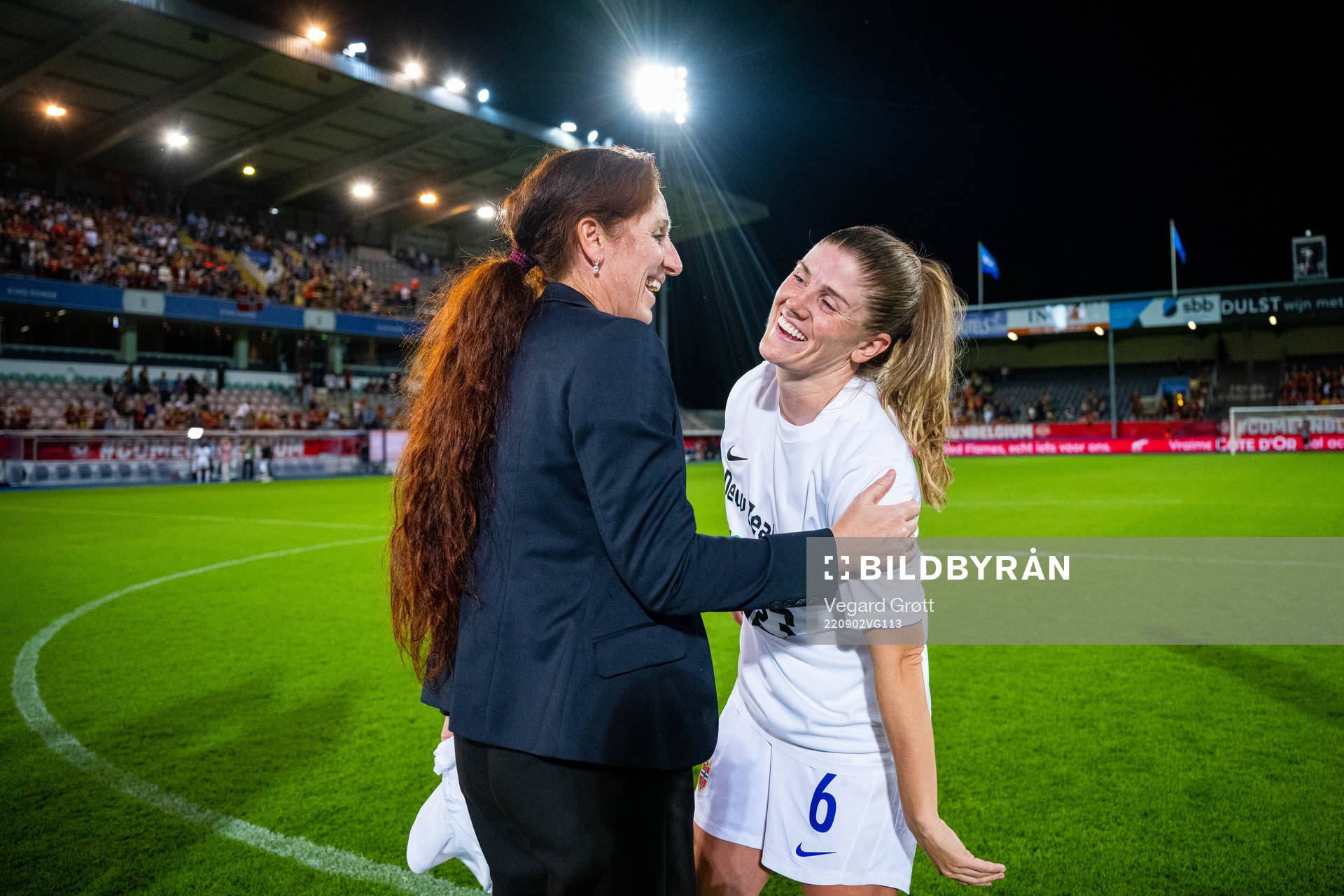 Lise Klaveness, president of the Norwegian Football Association (NFF), and Maren Mjelde celebrate after the FIFA Women's World Cup Qualifier football match between Belgium and Norway on September 2, 2022 in Leuven.