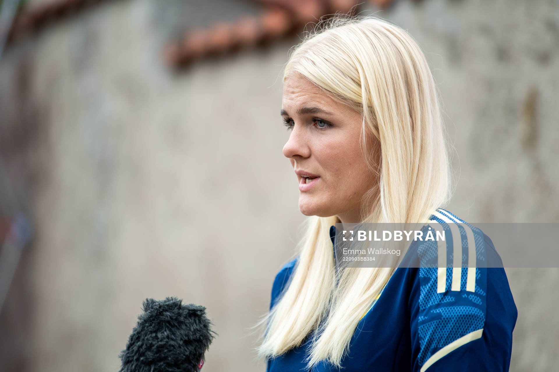Goalkeeper Emma Holmgren is interviewed by the media