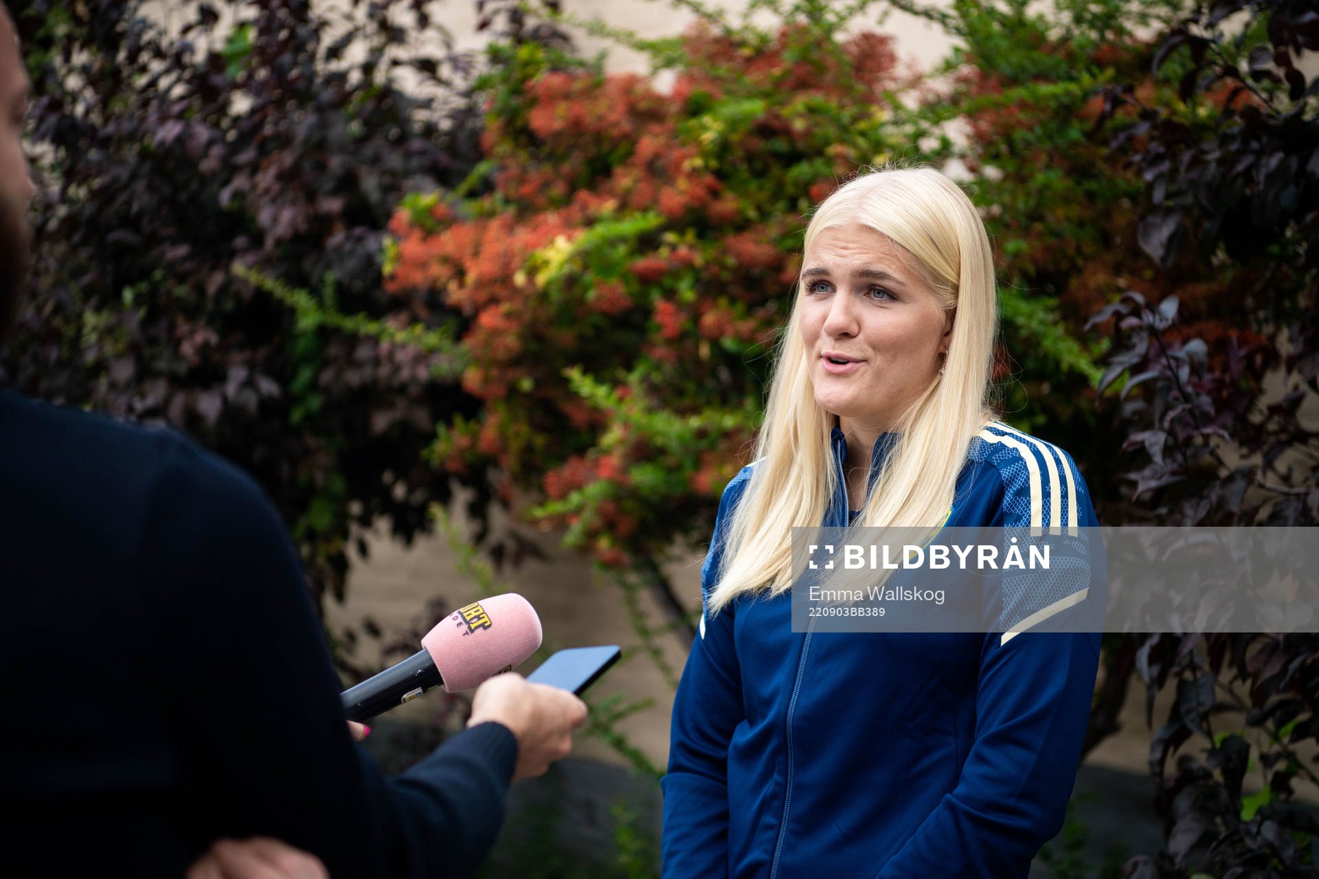 Goalkeeper Emma Holmgren is interviewed by the media during a press event with the women's national football team of Sweden on September 3, 2022 in Visby.