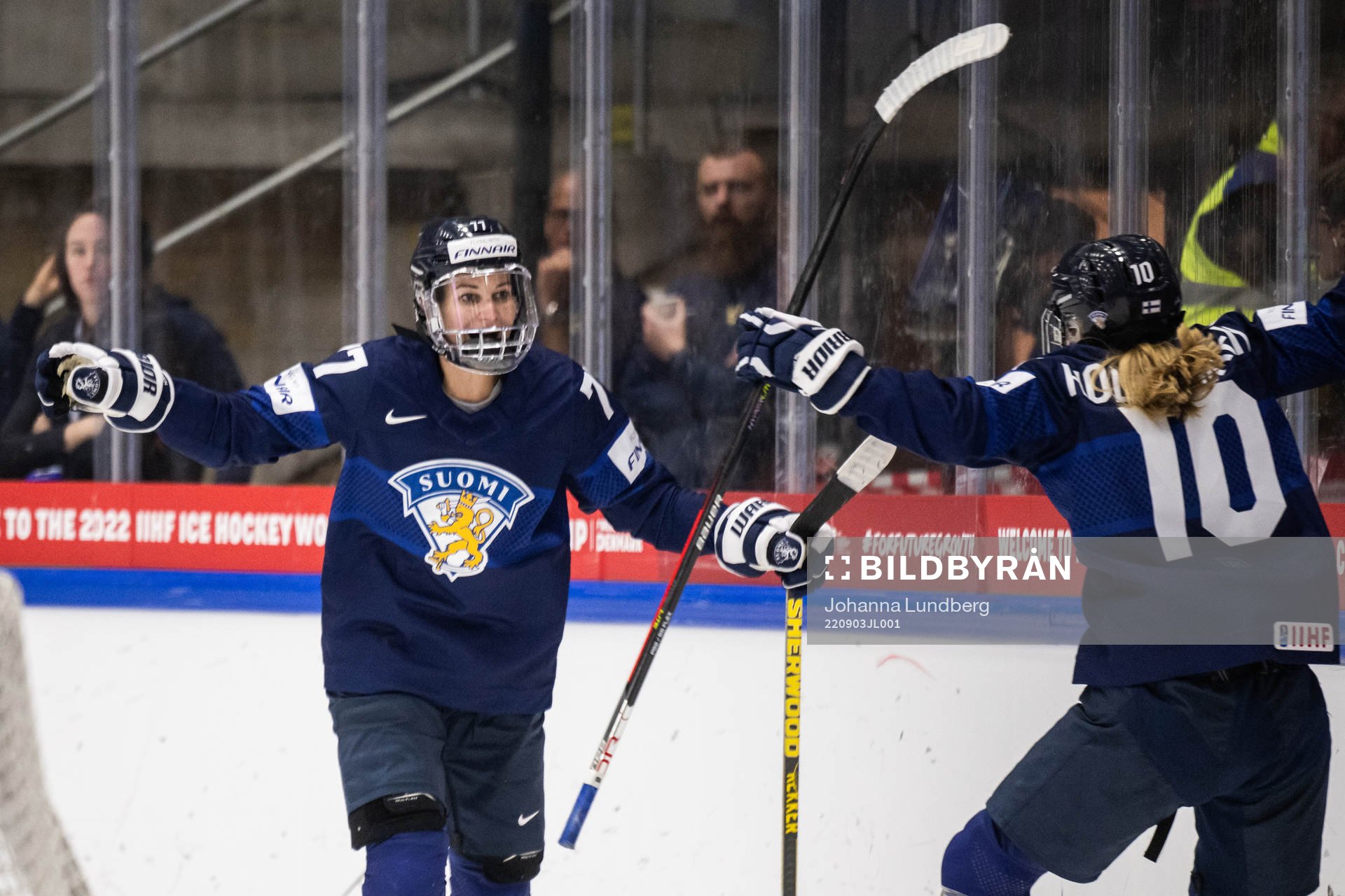 Susanna Tapani and Elisa Holopainen of Finland celebrate