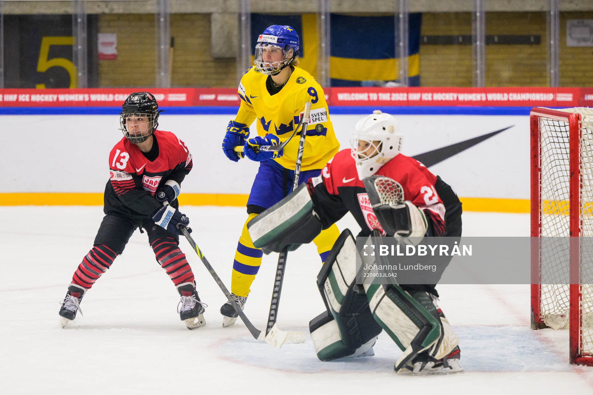 Chisato Miyazaki of Japan and goaltender Miyuu Masuhara of