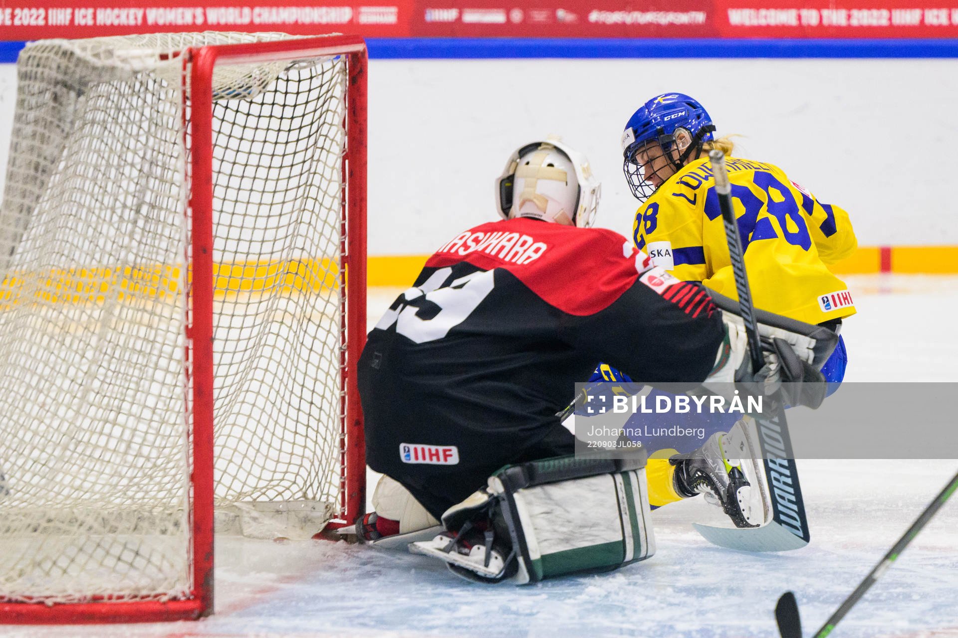 goaltender Miyuu Masuhara of Japan and Michelle Löwenhielm