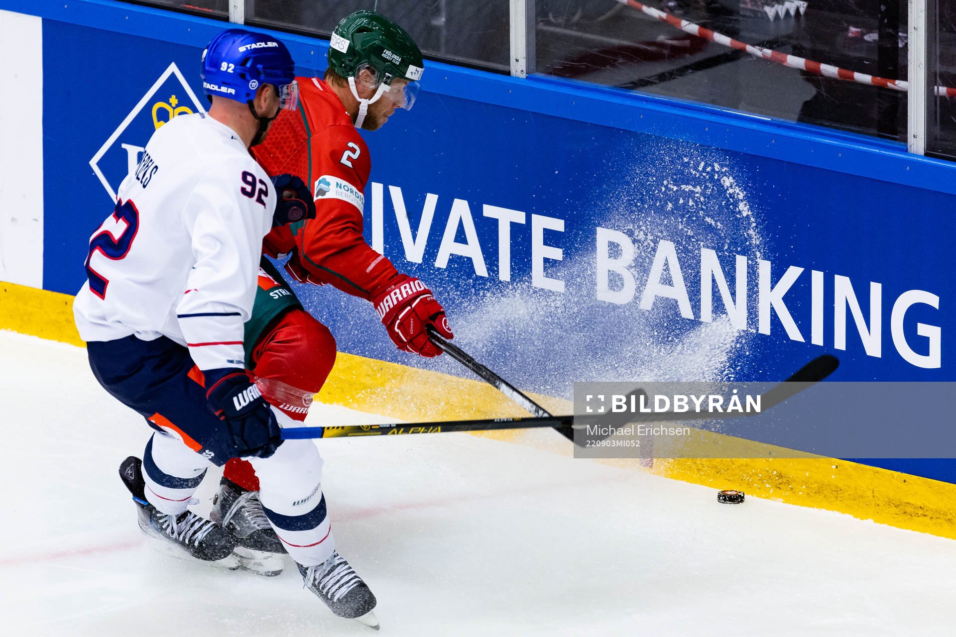 Marcel Noebels of Eisbären Berlin and Christian Folin of